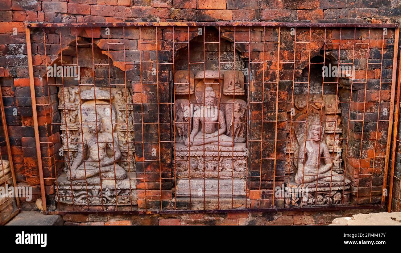 Sculptures Now protected by a grille in the Ratnagiri Buddhist Monastery, Odisha, India Stock