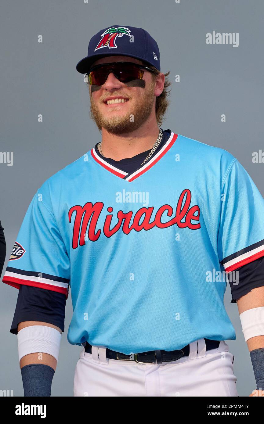 Fort Myers Miracle Andrew Cossetti (33) during introductions before a MiLB Florida  State League baseball game against the Dunedin Blue Jays on April 6, 2023  at Hammond Stadium in Fort Myers, Florida.