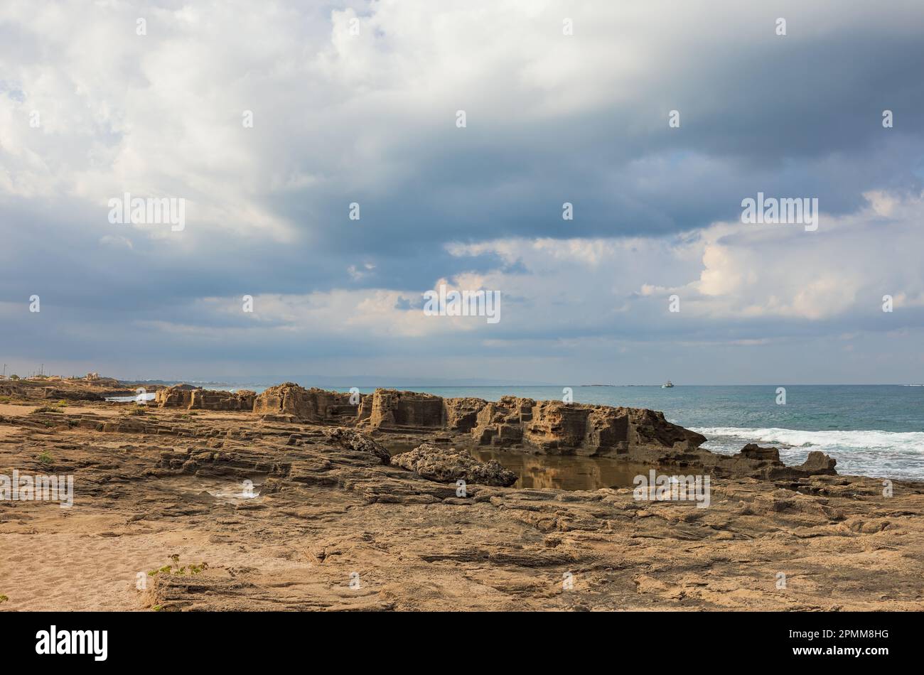 Coast of the mediterranean sea in the north of Israel with beautiful clouds Stock Photo
