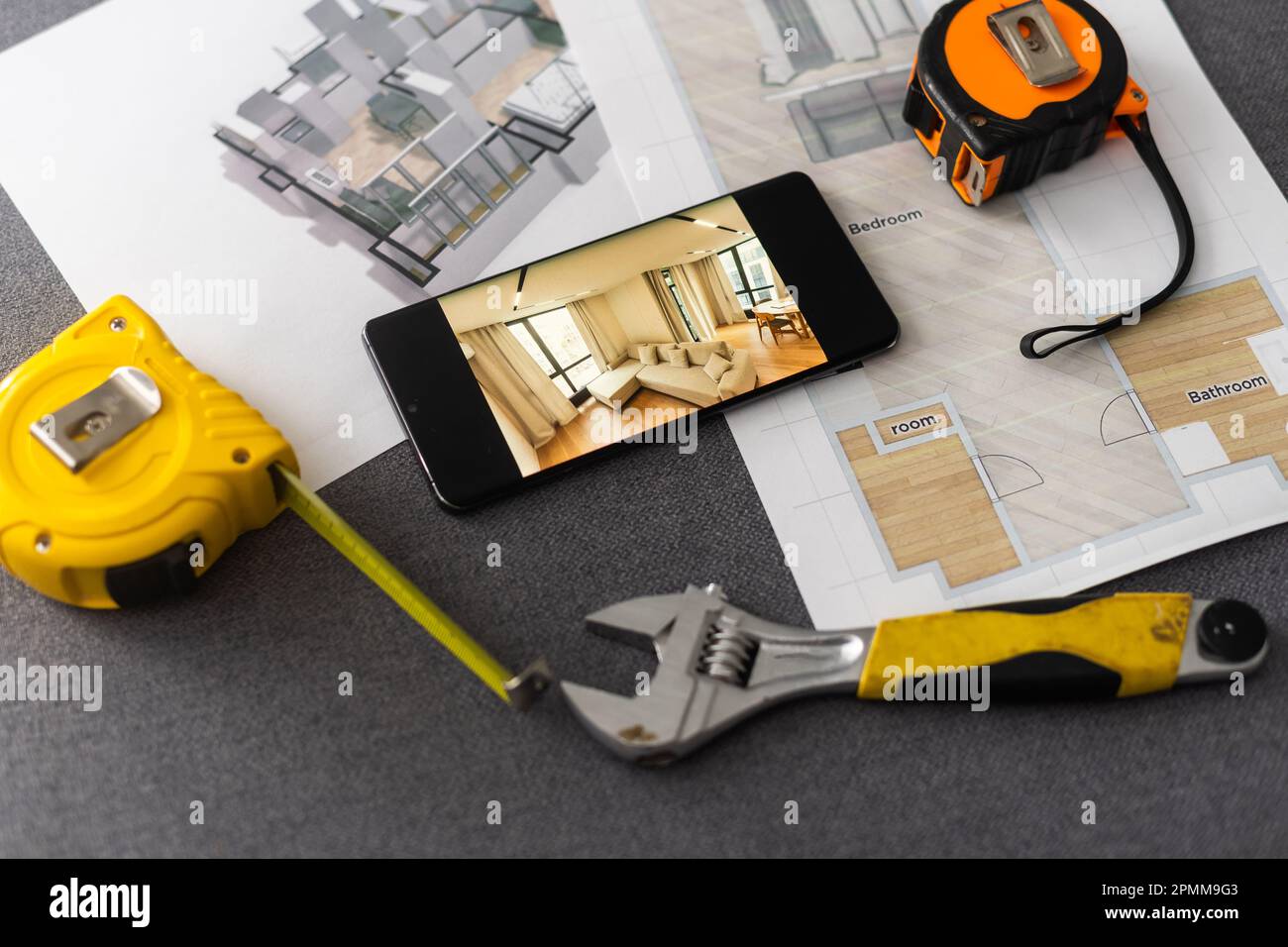 website wireframe sketch and programming code on smartphone Stock Photo