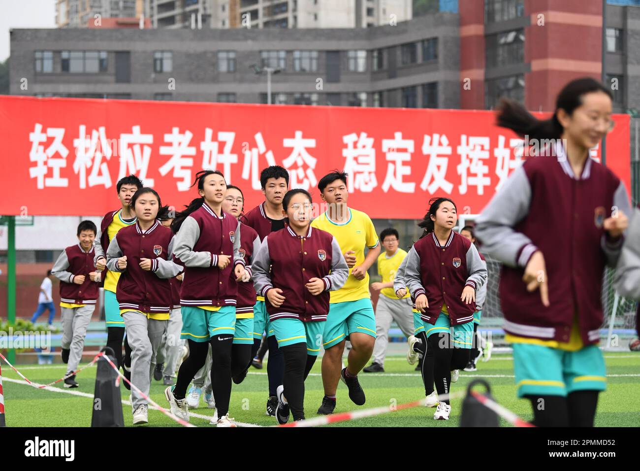 GUIYANG, CHINA APRIL 14, 2023 Middle school graduates warm up