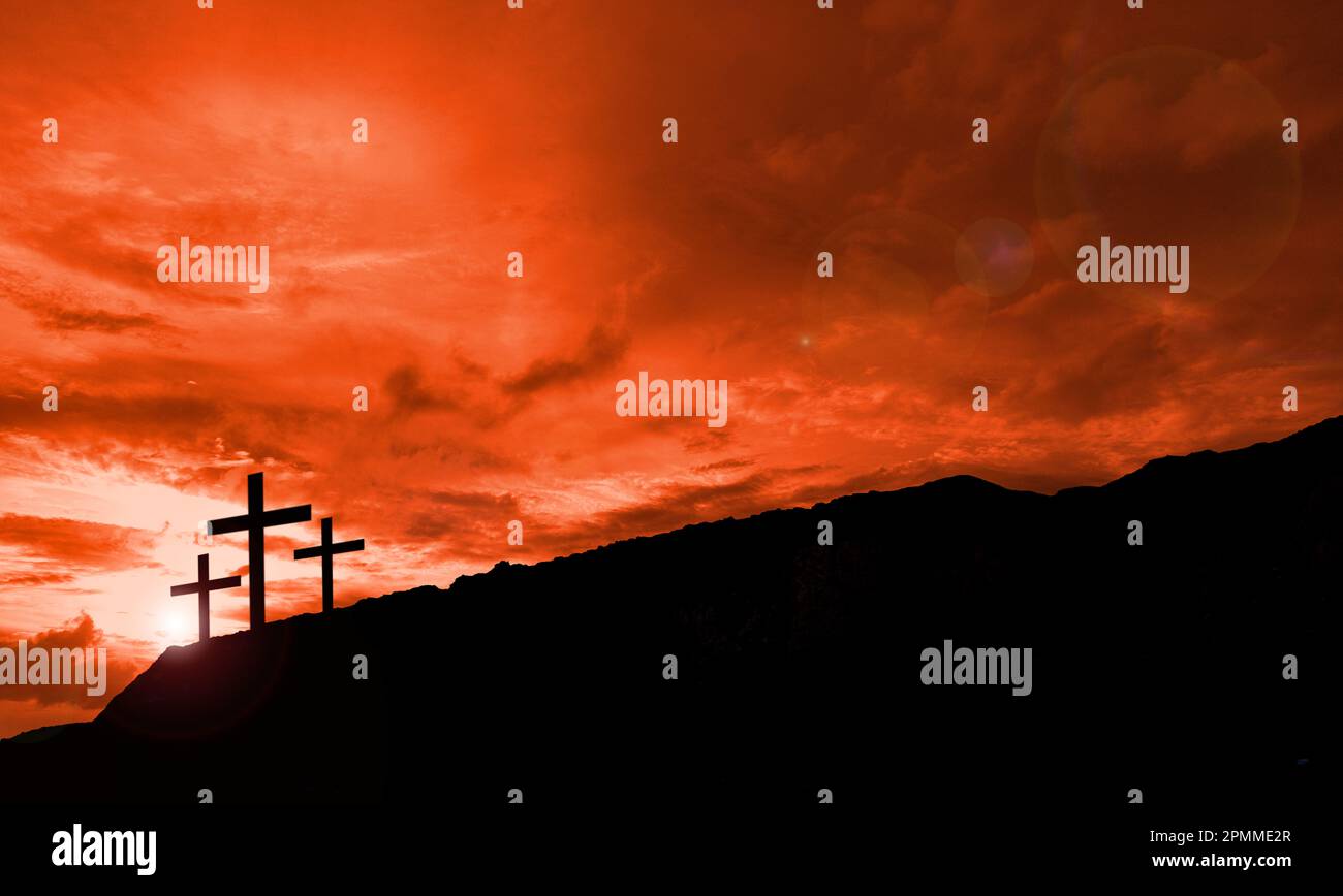 Silhouette of christian cross on the sunset sky background Stock Photo ...