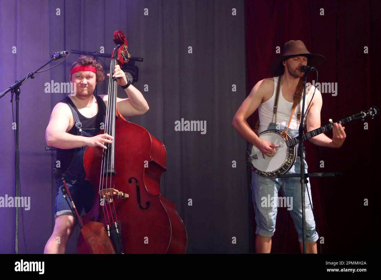 Banjo and double bass player on stage Stock Photo