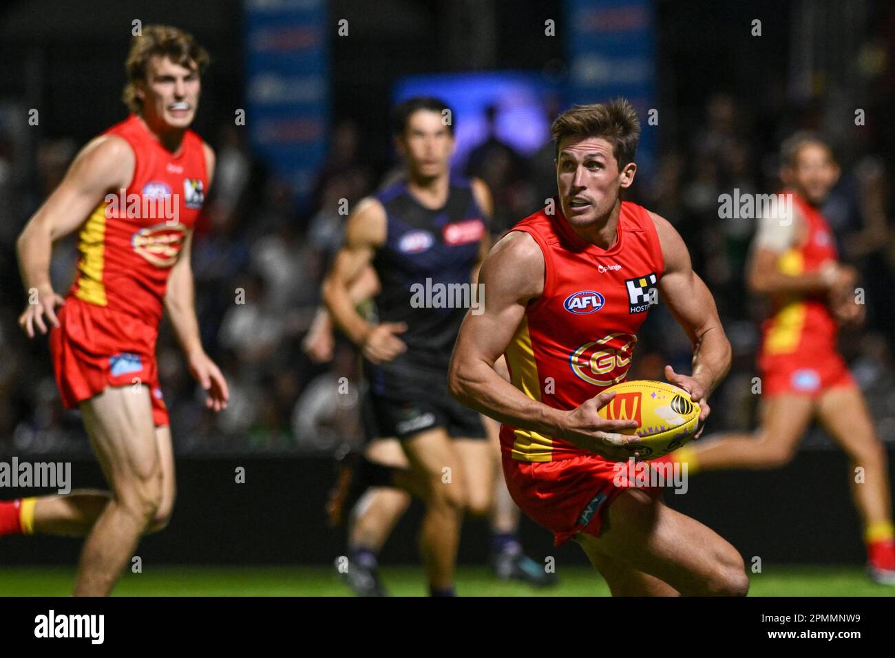 David Swallow of the Gold Coast Suns gathers in defence during the AFL