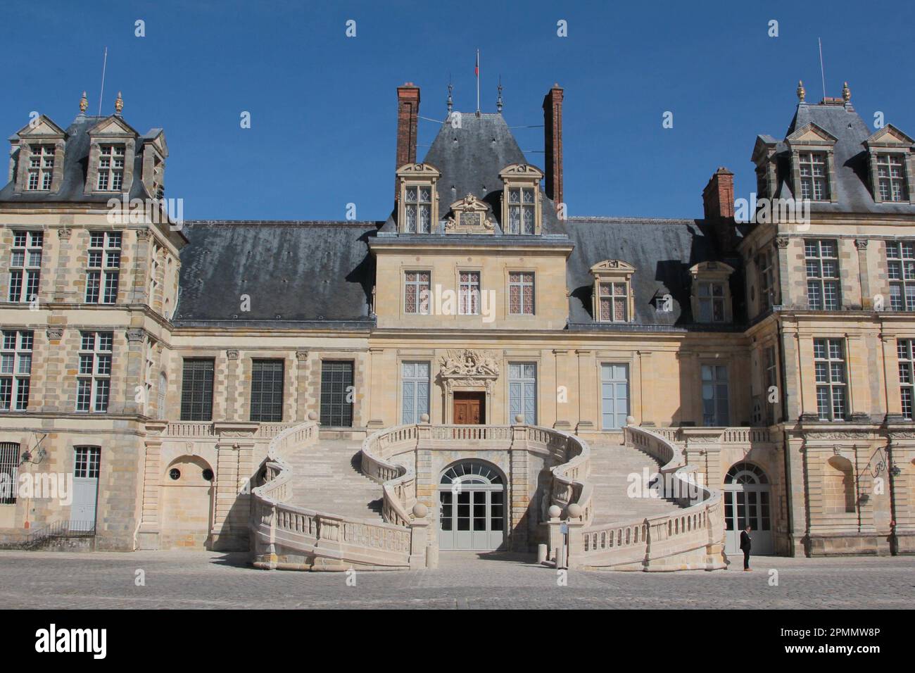 Fontainebleau Palace's main facade and the Horseshoe staircase after being renovated in 2022 Stock Photo