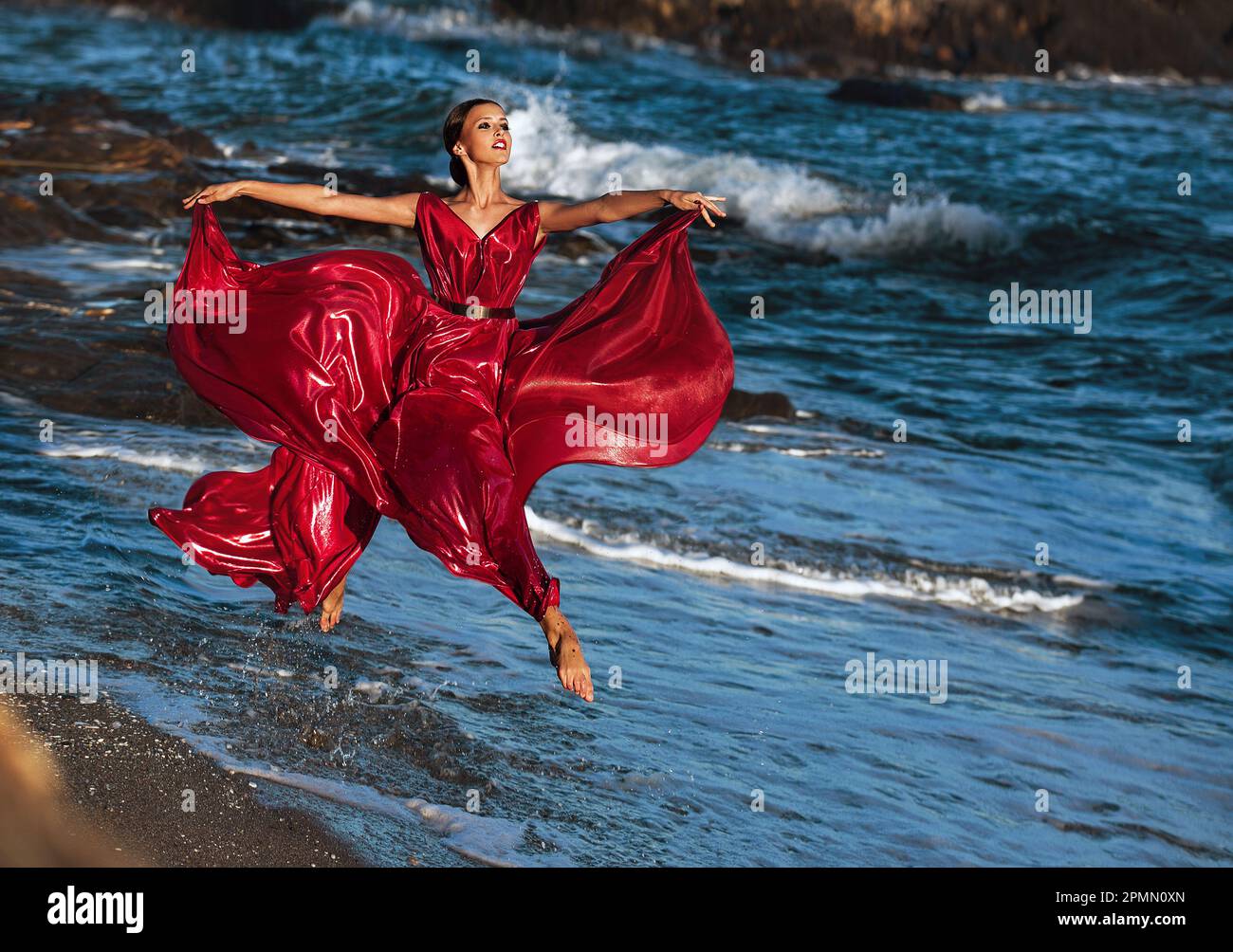 Flamenco dancer in a red dress posing in nature Stock Photo - Alamy