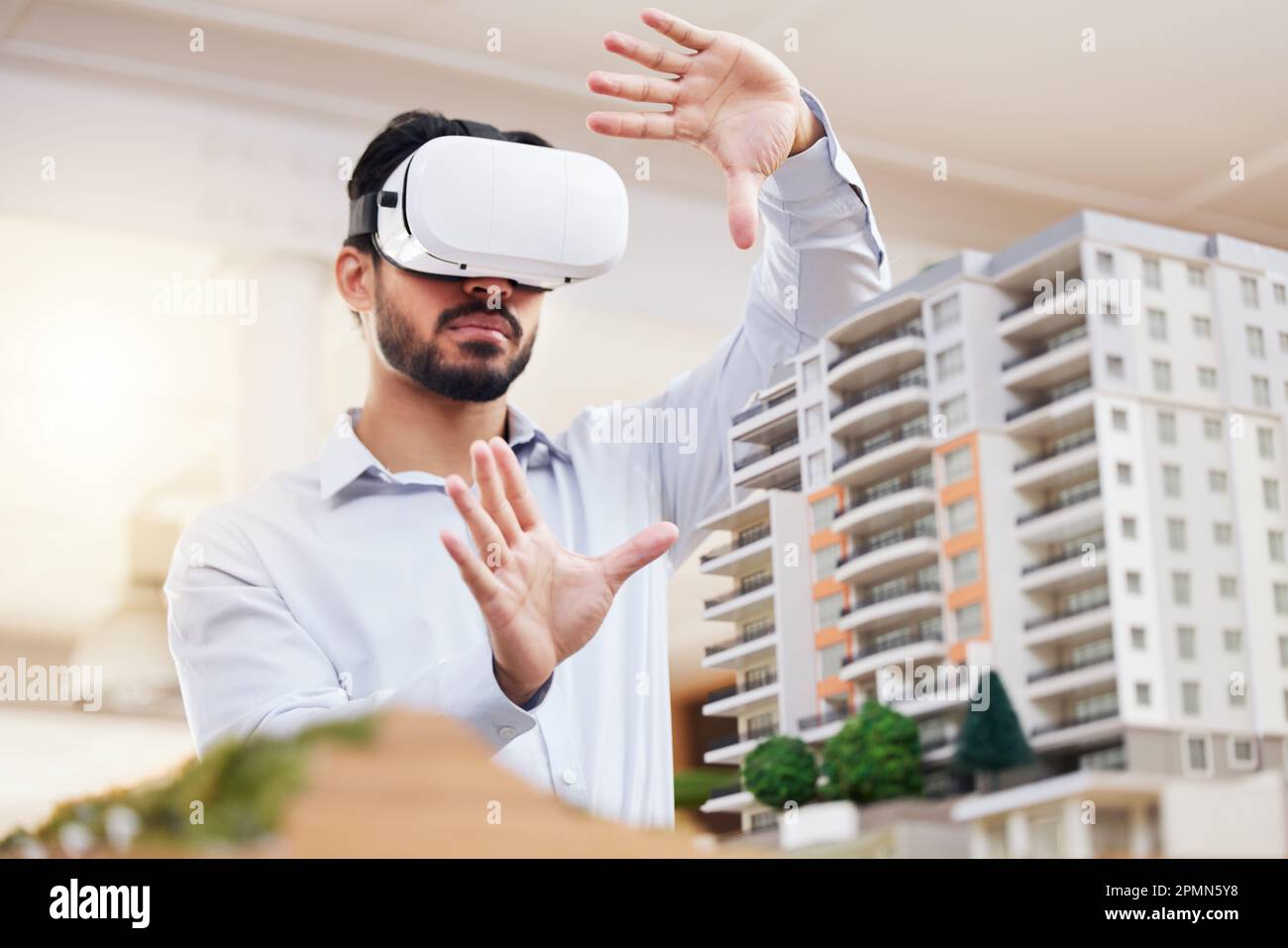 Architect, man and VR architecture model, construction and building with future technology and UX. Virtual reality goggles, design and engineering Stock Photo