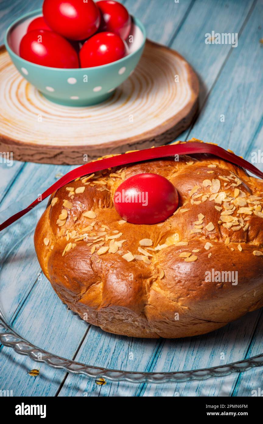 Easter Traditional Bread, Greek Tsoureki And Red Eggs On A Table Stock