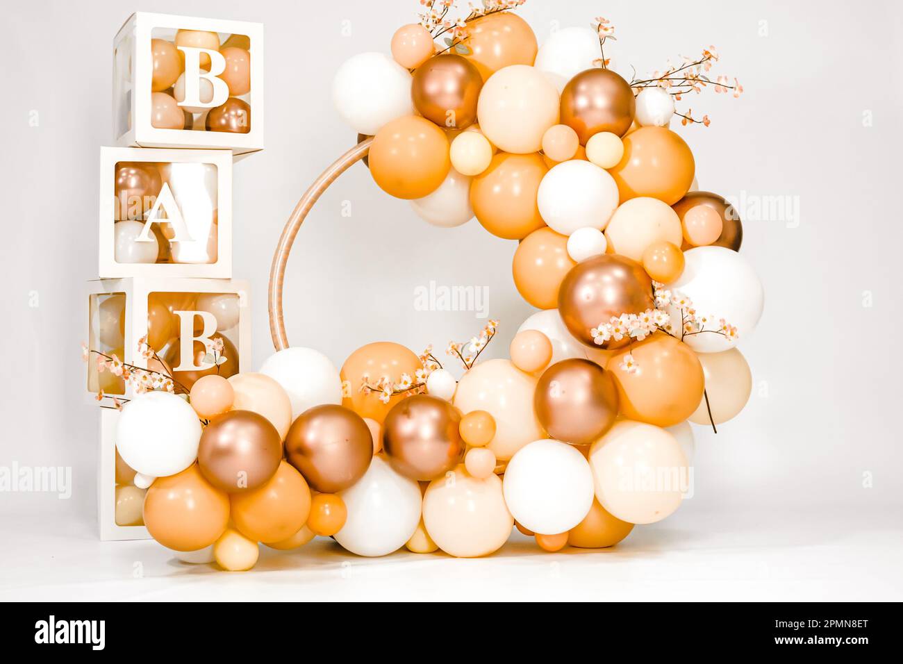 Orange white bright balloon decorated photo zone for little baby girl ...
