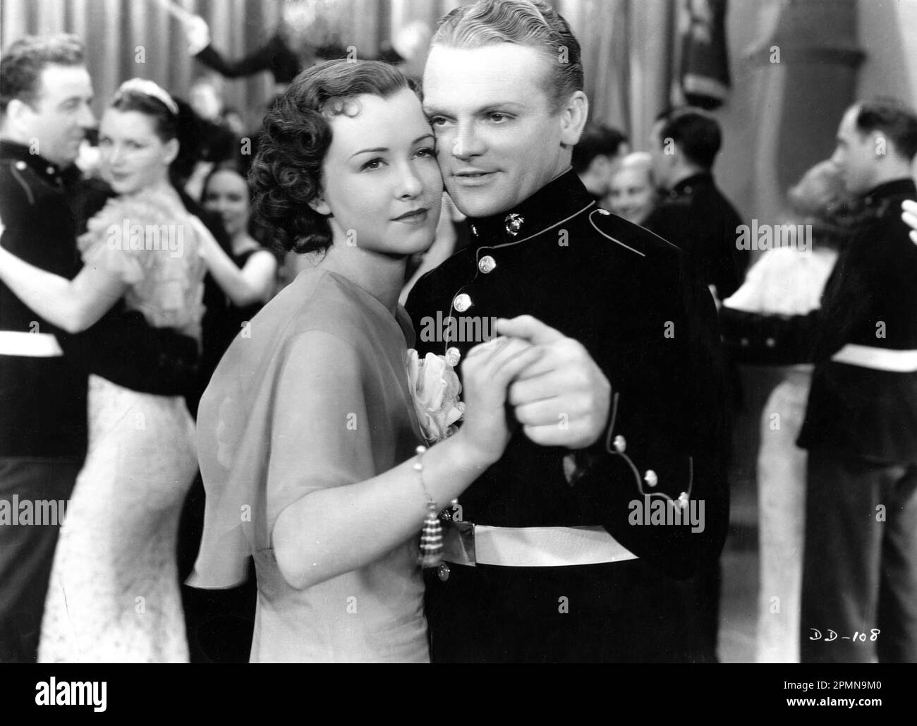 MARGARET LINDSAY and JAMES CAGNEY in DEVIL DOGS OF THE AIR 1935 director LLOYD BACON based on story by John Monk Saunders costume design Orry-Kelly A Cosmopolitan Production / Warner Bros. Stock Photo