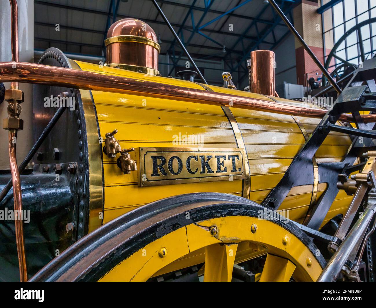 General image inside the National Railway Museum in York seen here featuring a replica of Robert Stephenson's Rocket locomotive Stock Photo