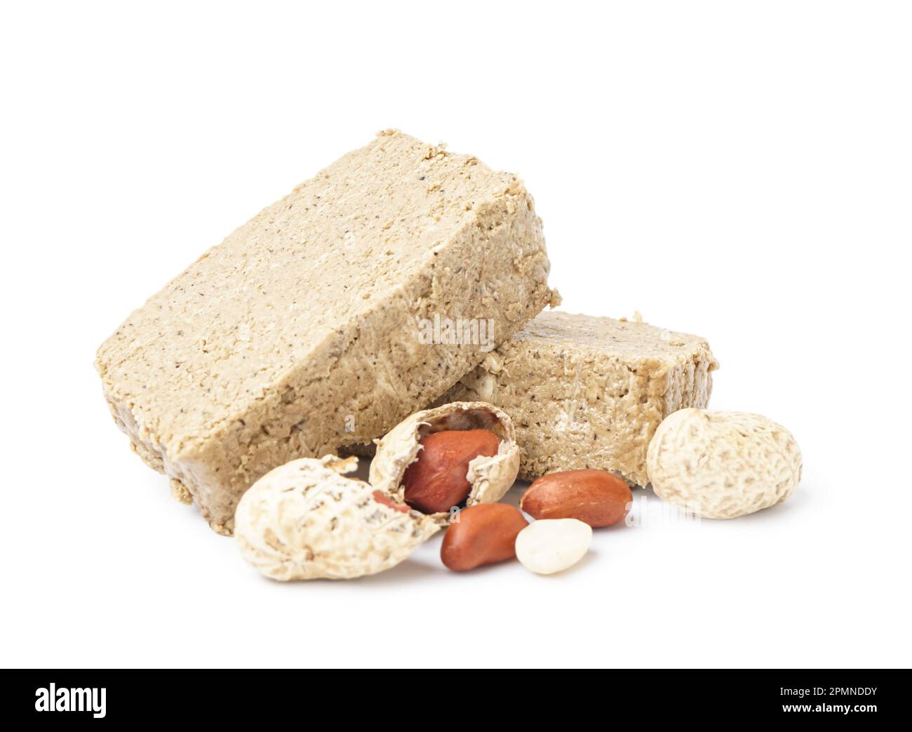 Pieces of sweet halva and peanuts on white background Stock Photo Alamy