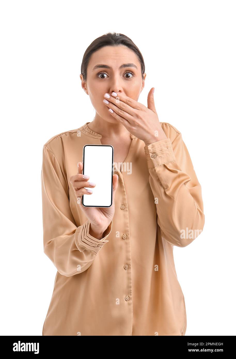 Surprised young woman with smartphone on white background Stock Photo ...