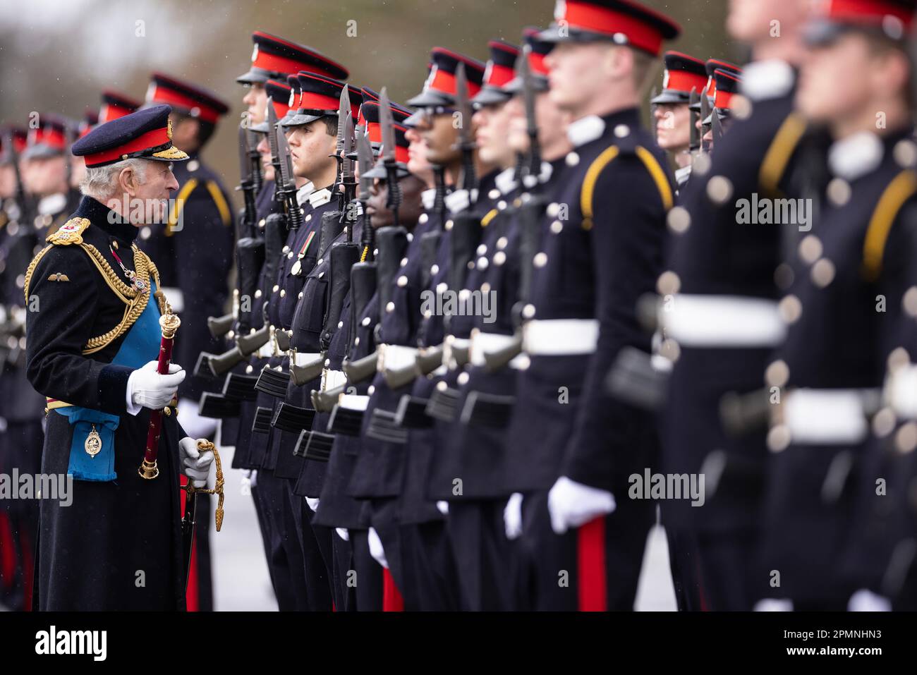 King Charles III inspects Officer Cadets on parade during the 200th ...