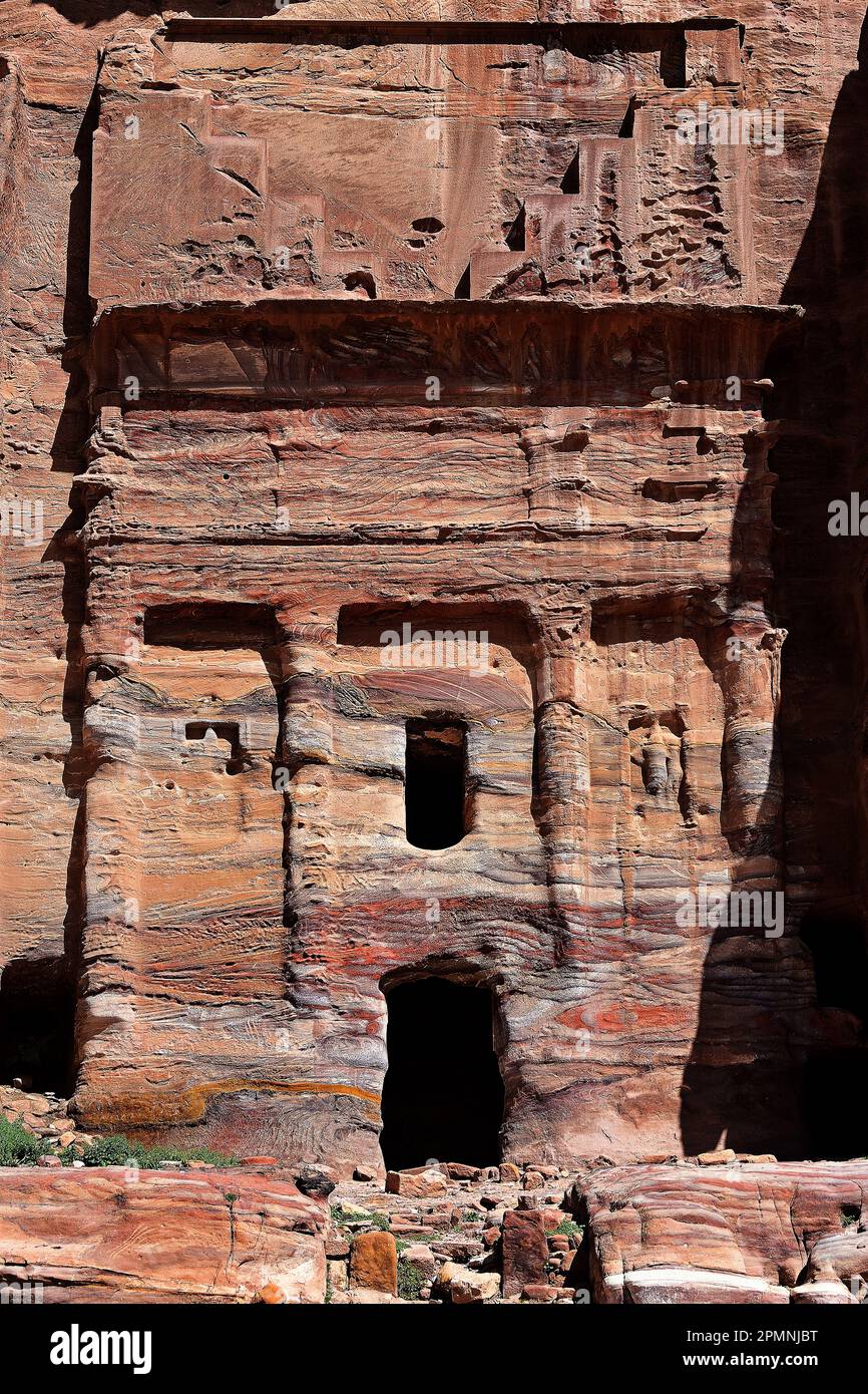 The silk tomb of the royal tombs  Petra city Nabataean caravan-city rock-cut façades Jordan carved sandstone rock desert. Stock Photo