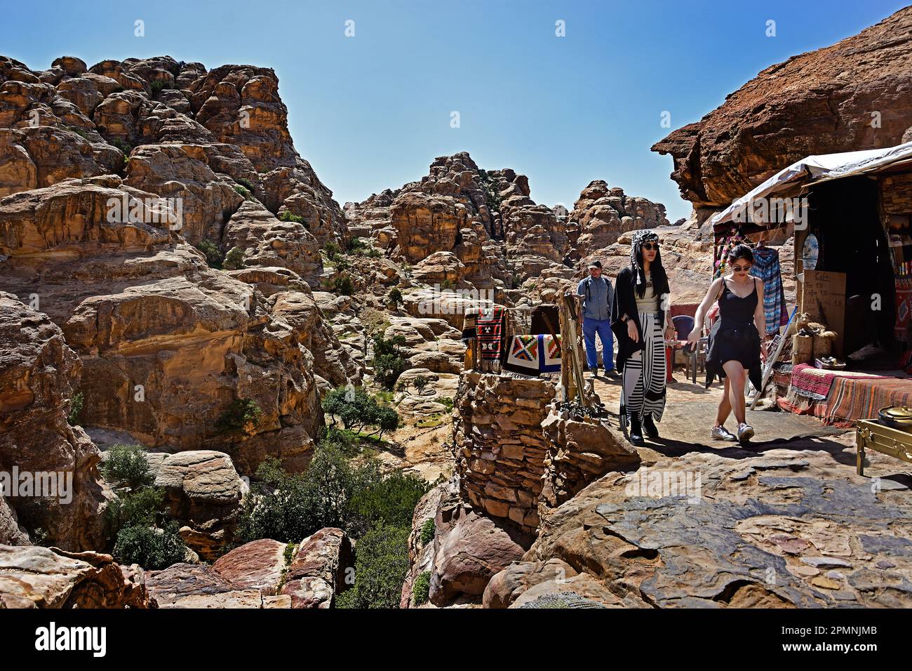 Petra city Nabataean caravan-city rock-cut façades Jordan carved sandstone rock desert. Stock Photo