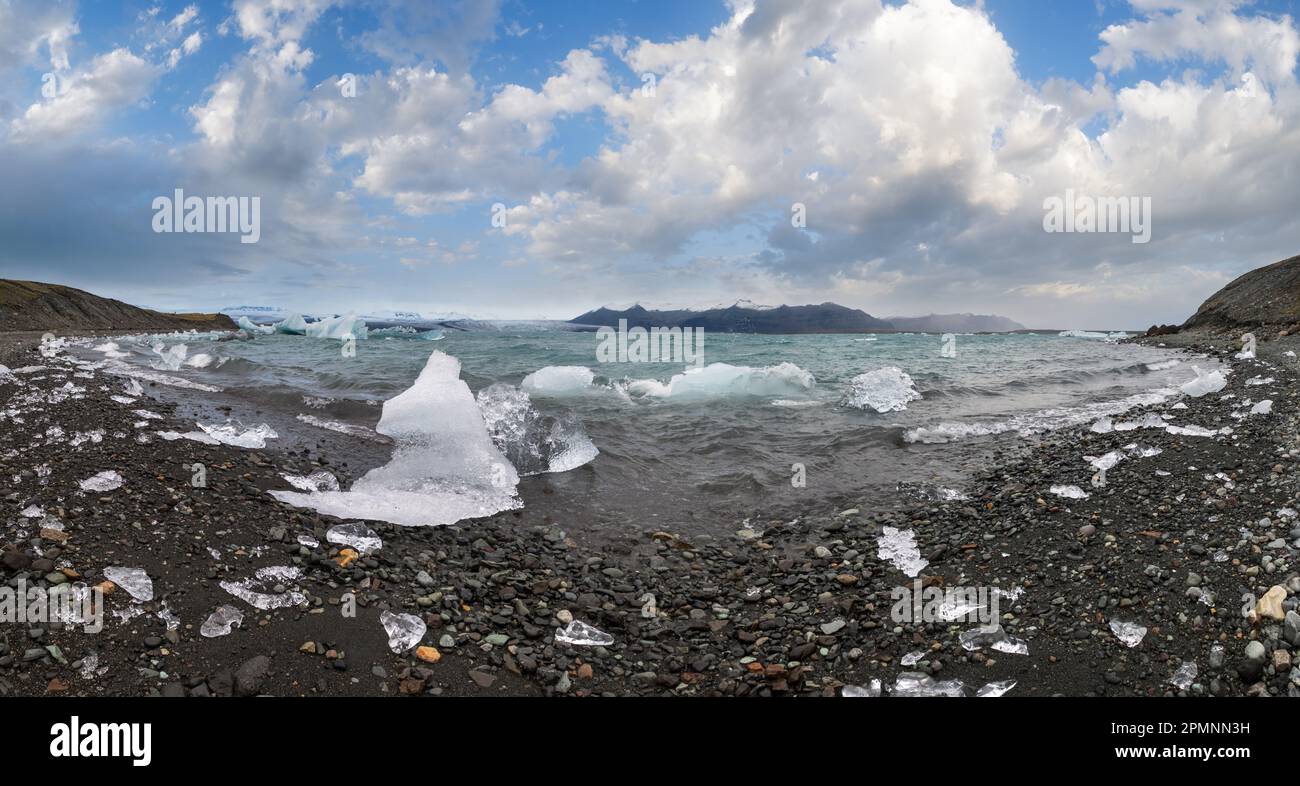 Jokulsarlon glacial lake, lagoon with ice blocks, Iceland. Situated near the edge of the Atlantic Ocean at the head of the Breidamerkurjokull glacier, Stock Photo