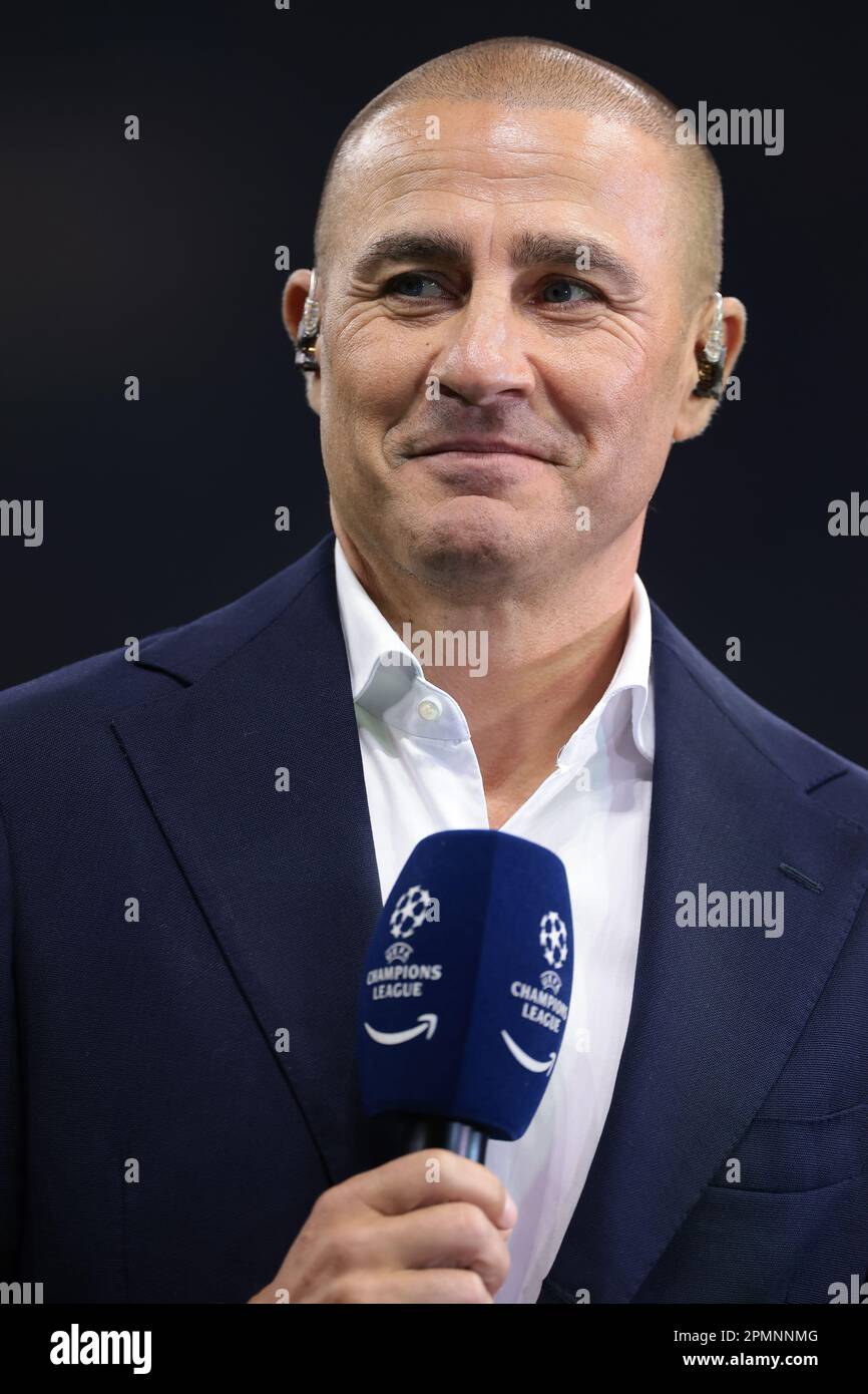 Milan, Italy. 12th Apr, 2023. Former Italy, Napoli, Parma, Internazionale, Juventus, Real Madrid and Al-Ahli defender Fabio Cannavaro reacts as he comments for Amazon Prime prior to the UEFA Champions League match at Giuseppe Meazza, Milan. Picture credit should read: Jonathan Moscrop/Sportimage Credit: Sportimage/Alamy Live News Stock Photo