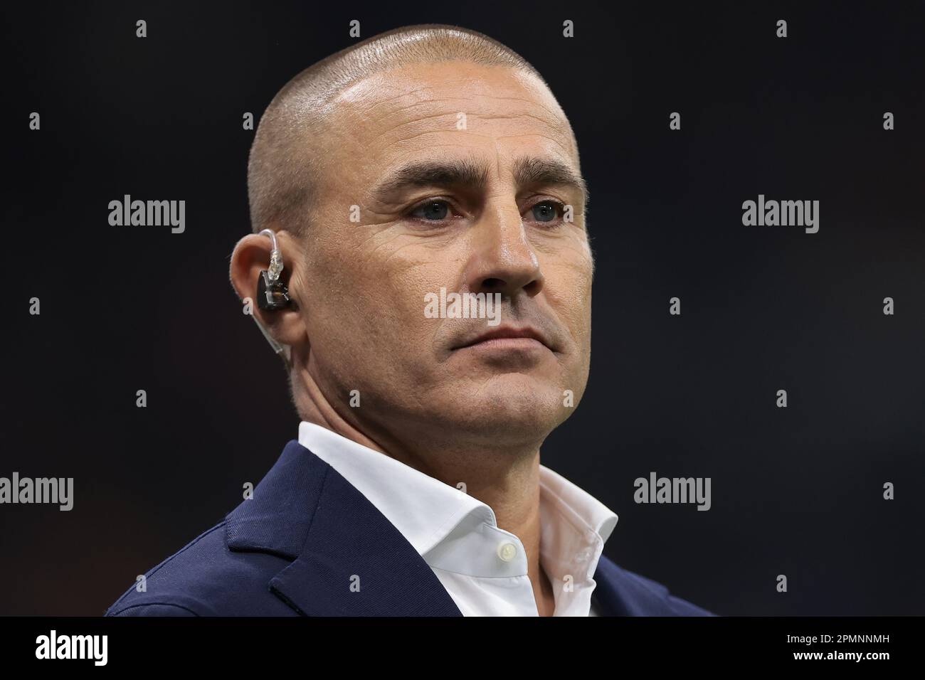 Milan, Italy. 12th Apr, 2023. Former Italy, Napoli, Parma, Internazionale, Juventus, Real Madrid and Al-Ahli defender Fabio Cannavaro reacts as he comments for Amazon Prime prior to the UEFA Champions League match at Giuseppe Meazza, Milan. Picture credit should read: Jonathan Moscrop/Sportimage Credit: Sportimage/Alamy Live News Stock Photo