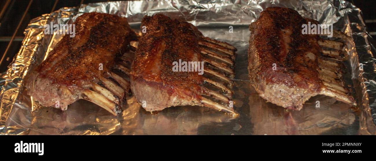 Lamb rack in the oven stock photo alamy