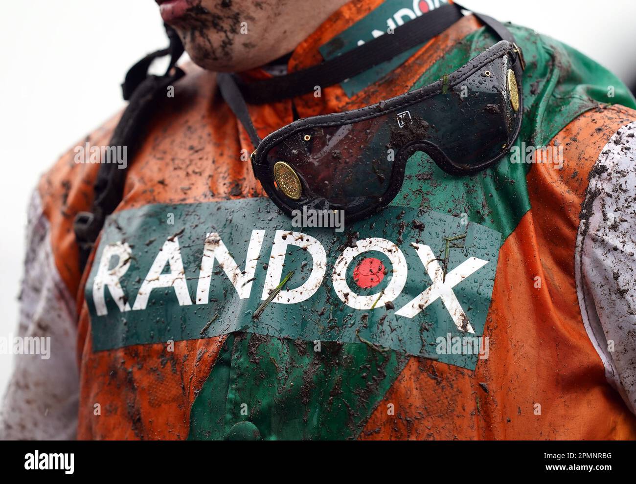 Jockey Liam Harrison covered in mud after the William Hill Handicap Hurdle on day two of the Randox Grand National Festival at Aintree Racecourse, Liverpool. Picture date: Friday April 14, 2023. Stock Photo