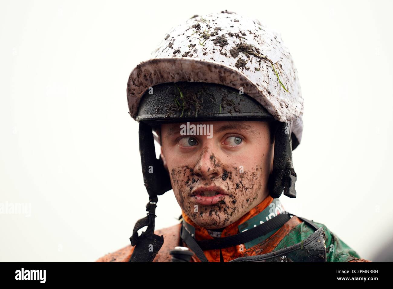 Jockey Liam Harrison covered in mud after the William Hill Handicap Hurdle on day two of the Randox Grand National Festival at Aintree Racecourse, Liverpool. Picture date: Friday April 14, 2023. Stock Photo