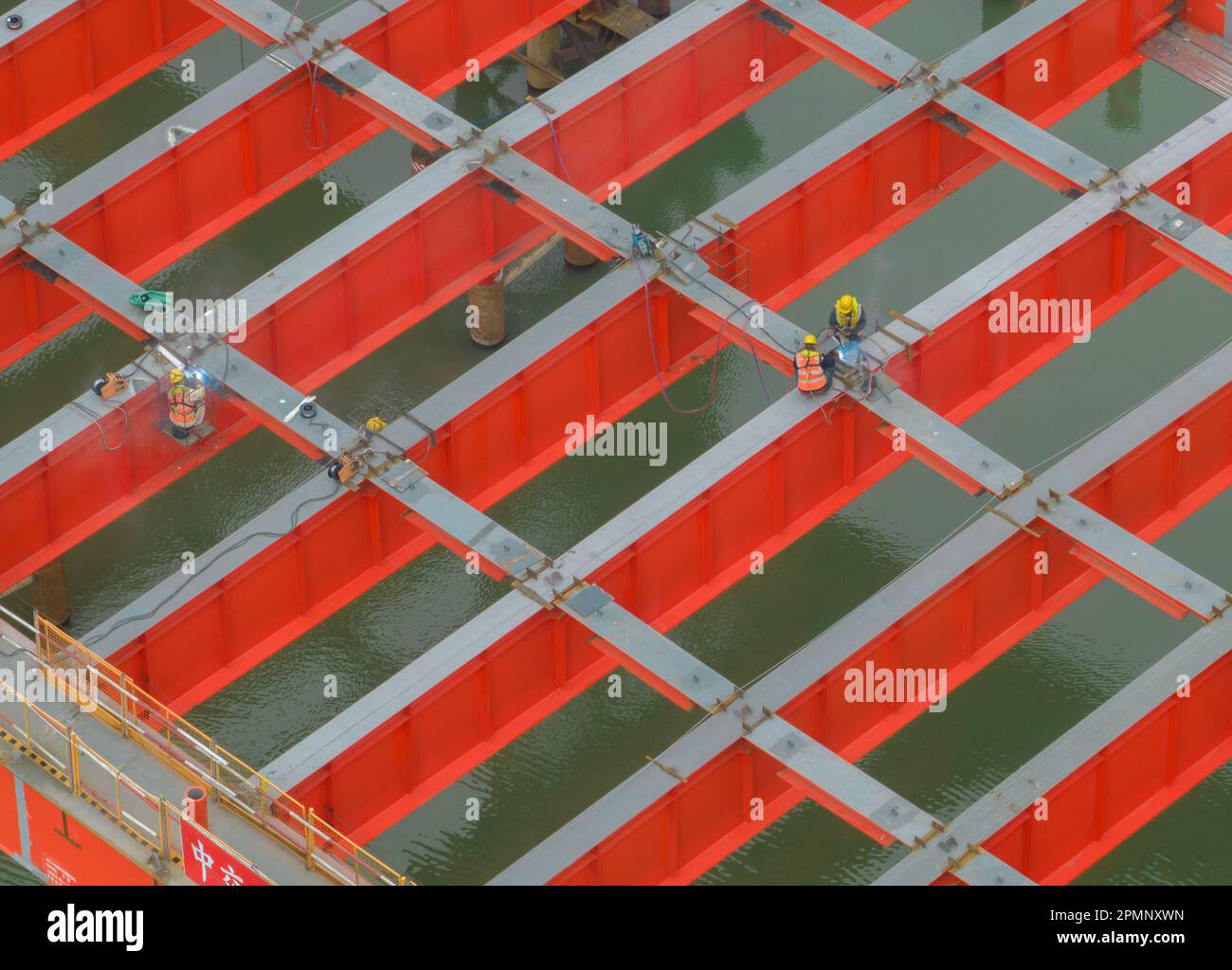 KUNSHAN, CHINA - APRIL 14, 2023 - Aerial photo shows workers at the ...