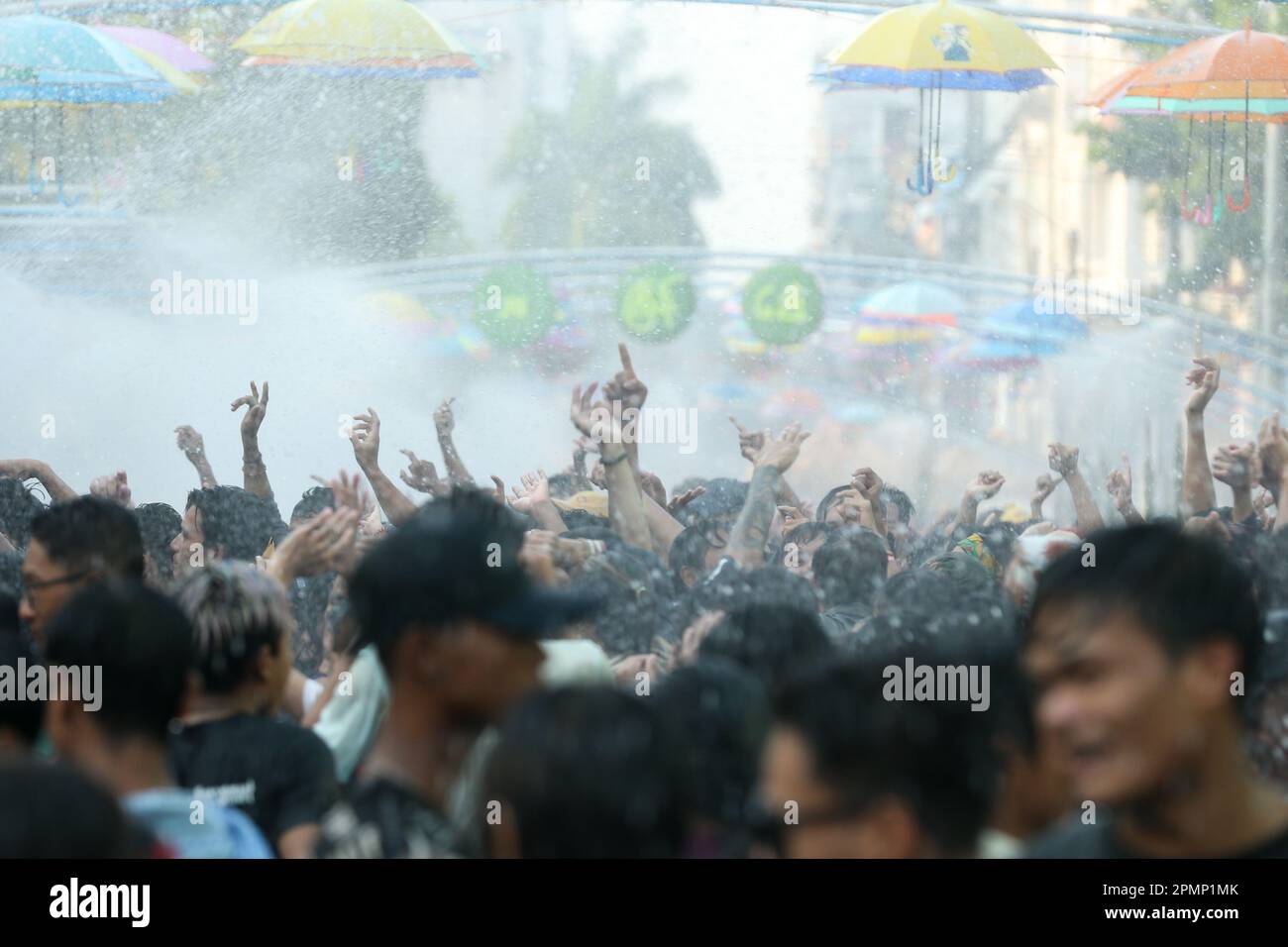 Yangon, Myanmar. 14th Apr, 2023. People celebrate the water festival in Yangon, Myanmar, April 14, 2023. Credit: Myo Kyaw Soe/Xinhua/Alamy Live News Stock Photo