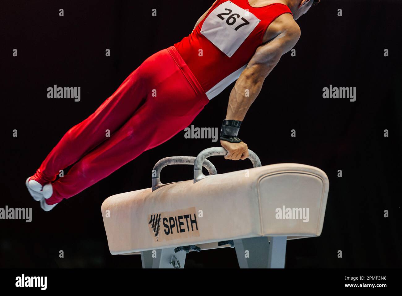 athlete gymnast exercise on pommel horse in gymnastics summer games