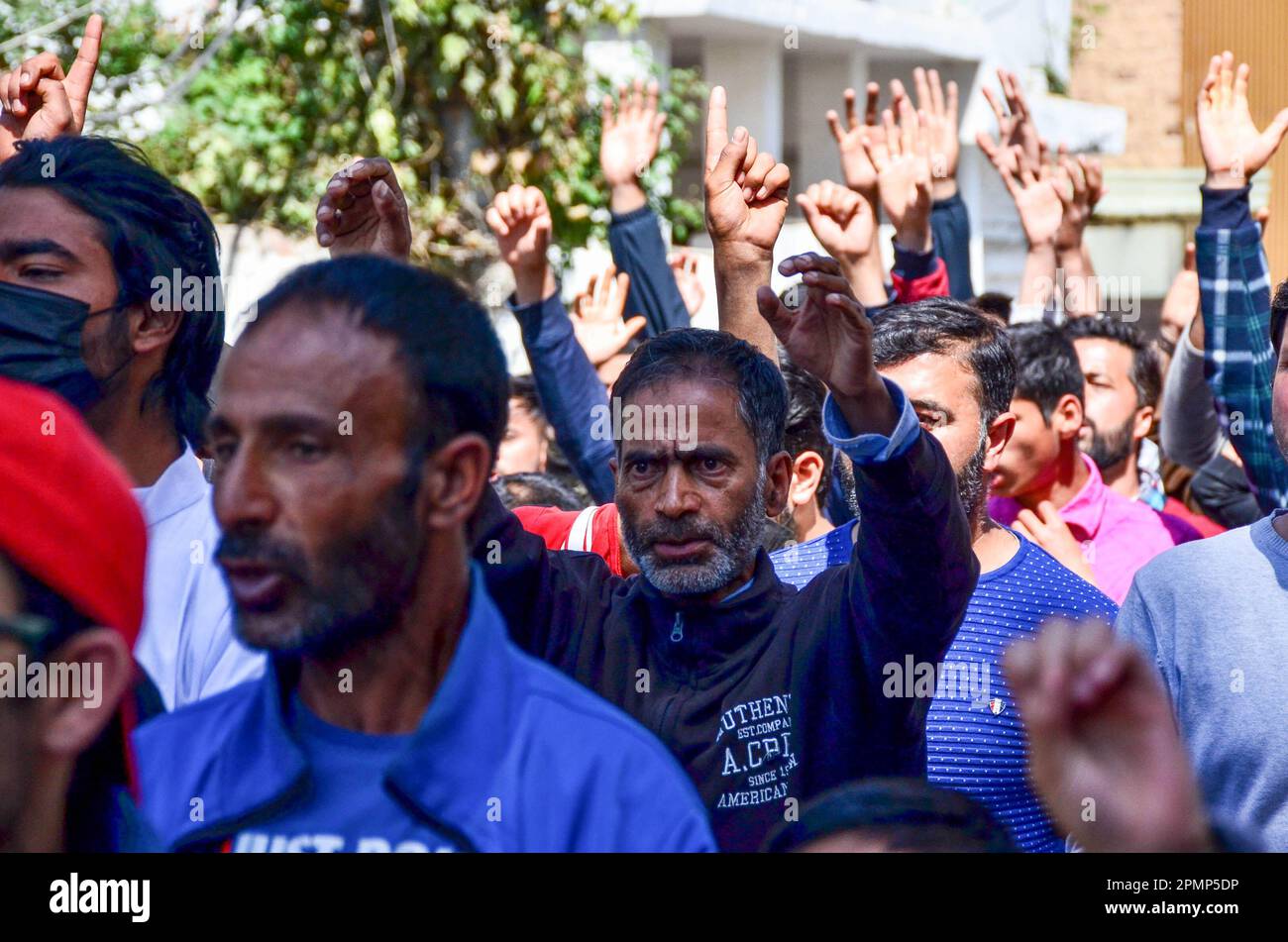 Srinagar, India. 14th Apr, 2023. Kashmiri Shiite Muslims shout slogans ...