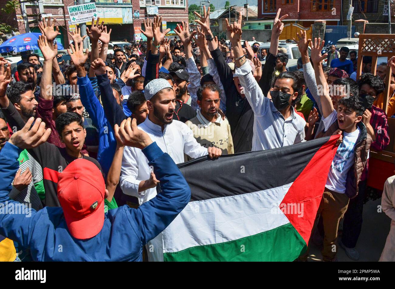 Srinagar, India. 14th Apr, 2023. Kashmiri Shiite Muslims hold a ...