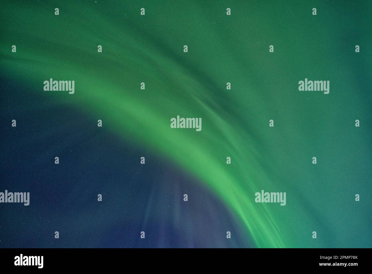 Aurora Borealis or northern lights glow green in the skies over ...