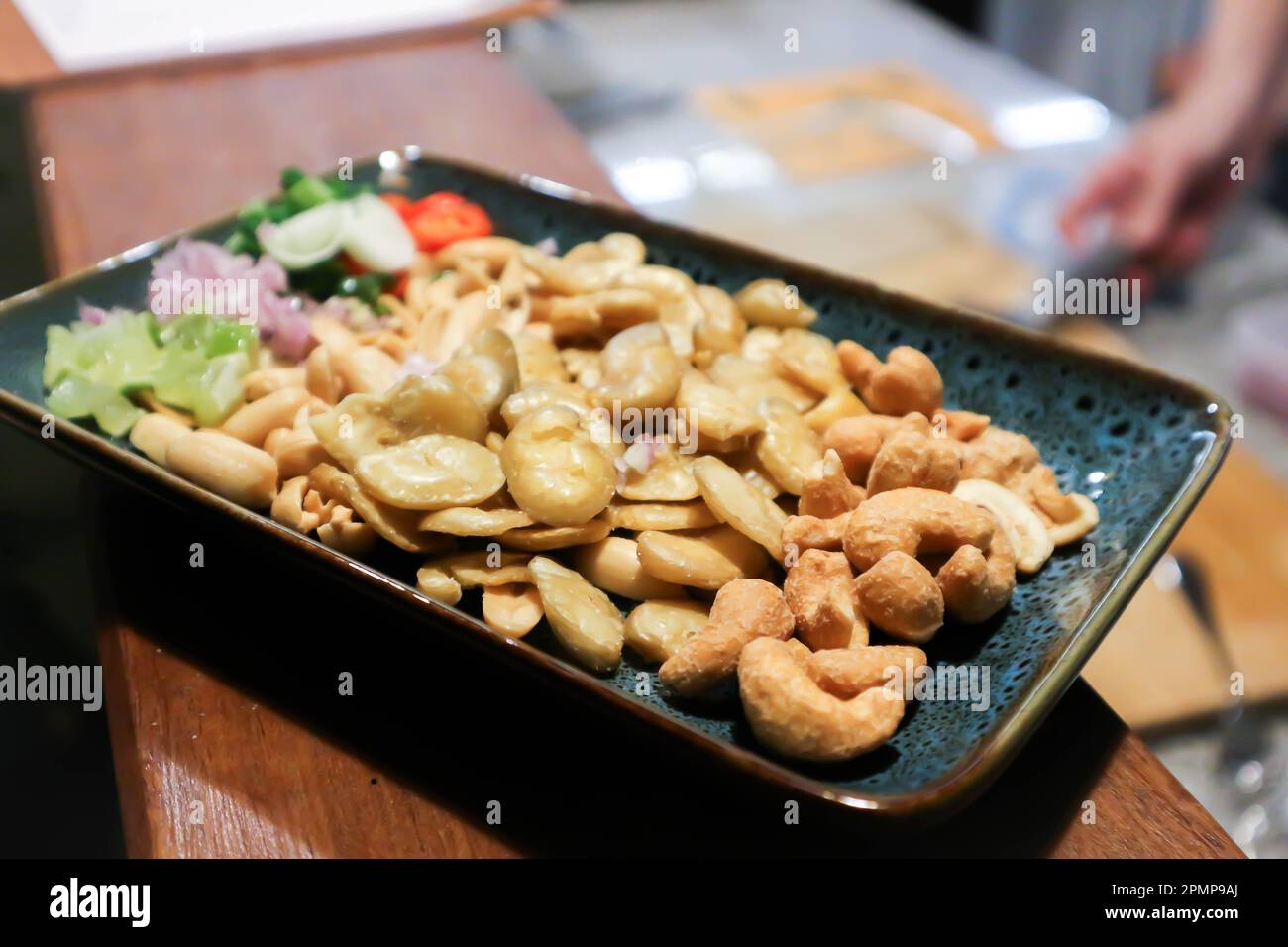 Broad bean , cashew nut and peanuts or fava beans with vegetable Stock