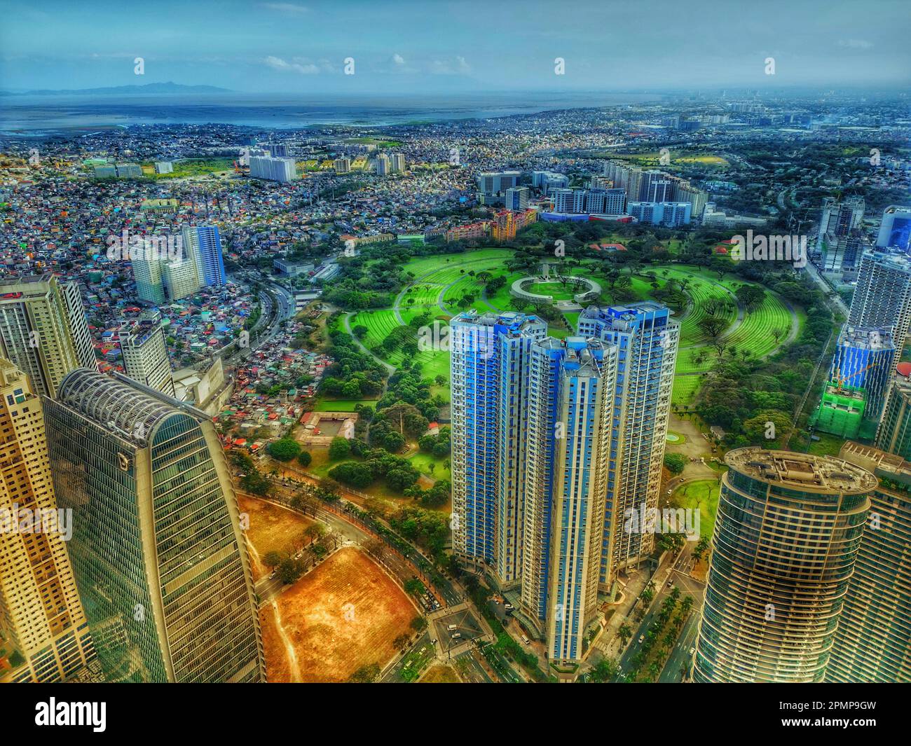 American Cemetary and Memorial + Trion Tower aerial view located Fort Bonifacio Taguig City Metro Manila Stock Photo