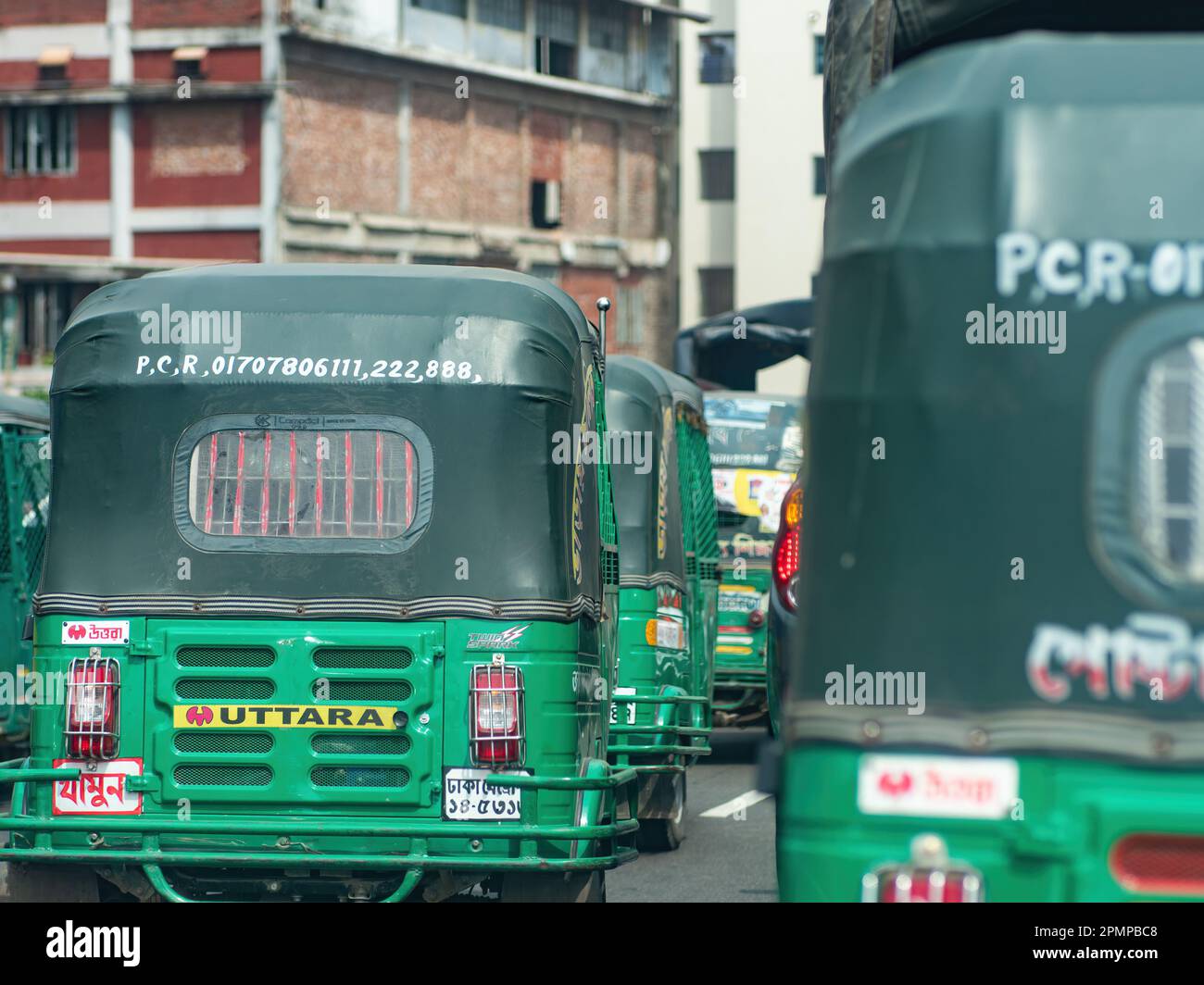 Auto rickshaws on the road in Dhaka, Bangladesh. Stock Photo
