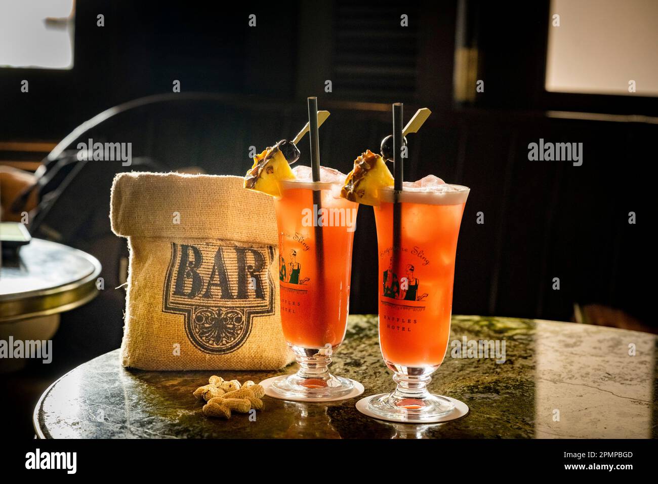 The world-famous Raffles bar in Singapore, home of the Singapore, sling. Stock Photo