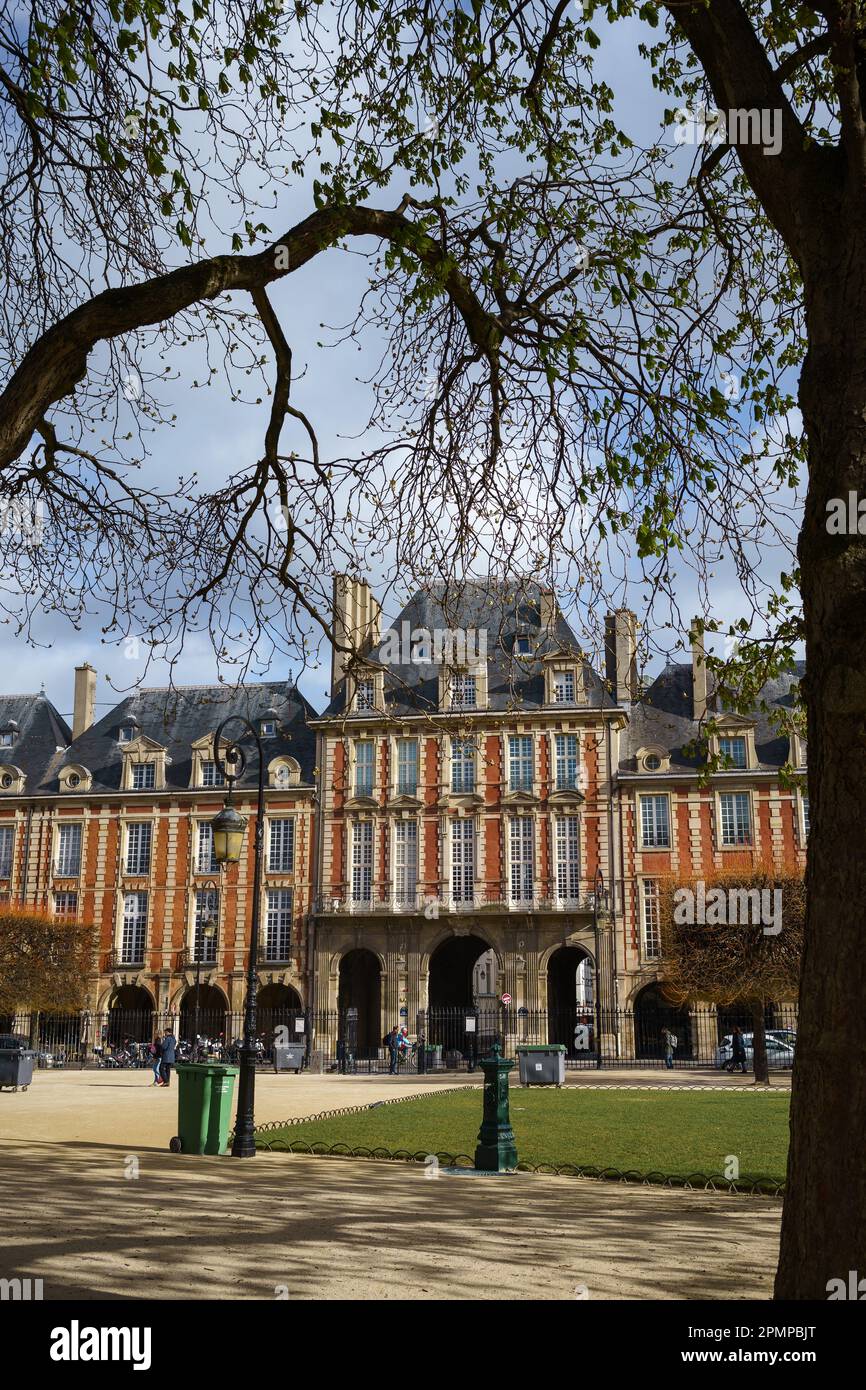 Place des Vosges (Place Royale) in springtime, the oldest planned square in Paris, France. Stock Photo