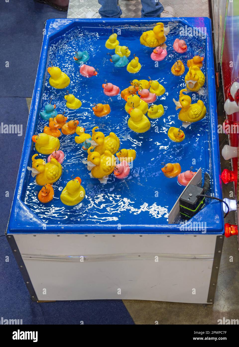 Fishing Rubber Ducks in Pool Amusement Park Kids Game Top View Stock Photo  - Alamy
