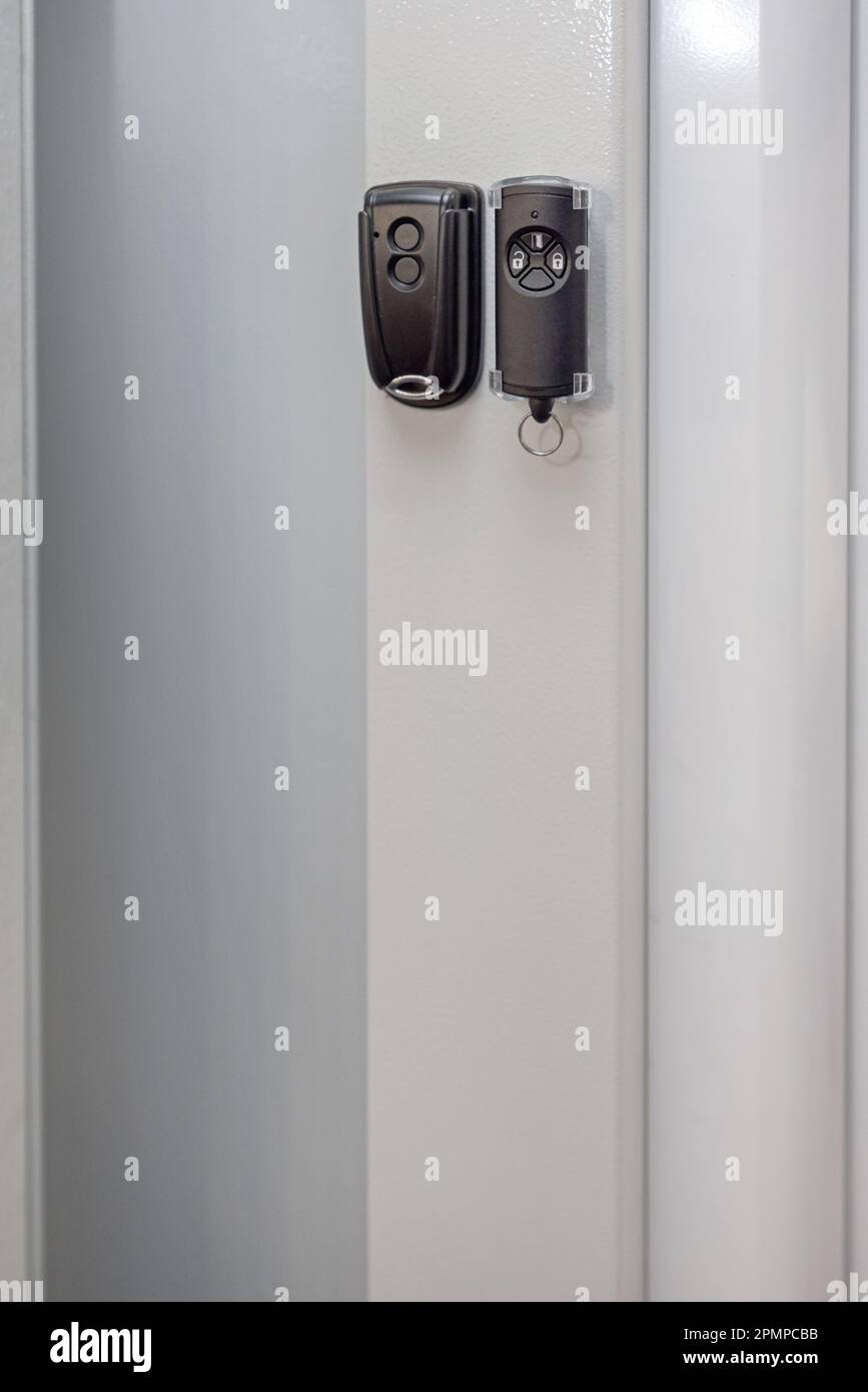 Two Remote Controls for Garage Doors House Equipment Wall Mounted Stock