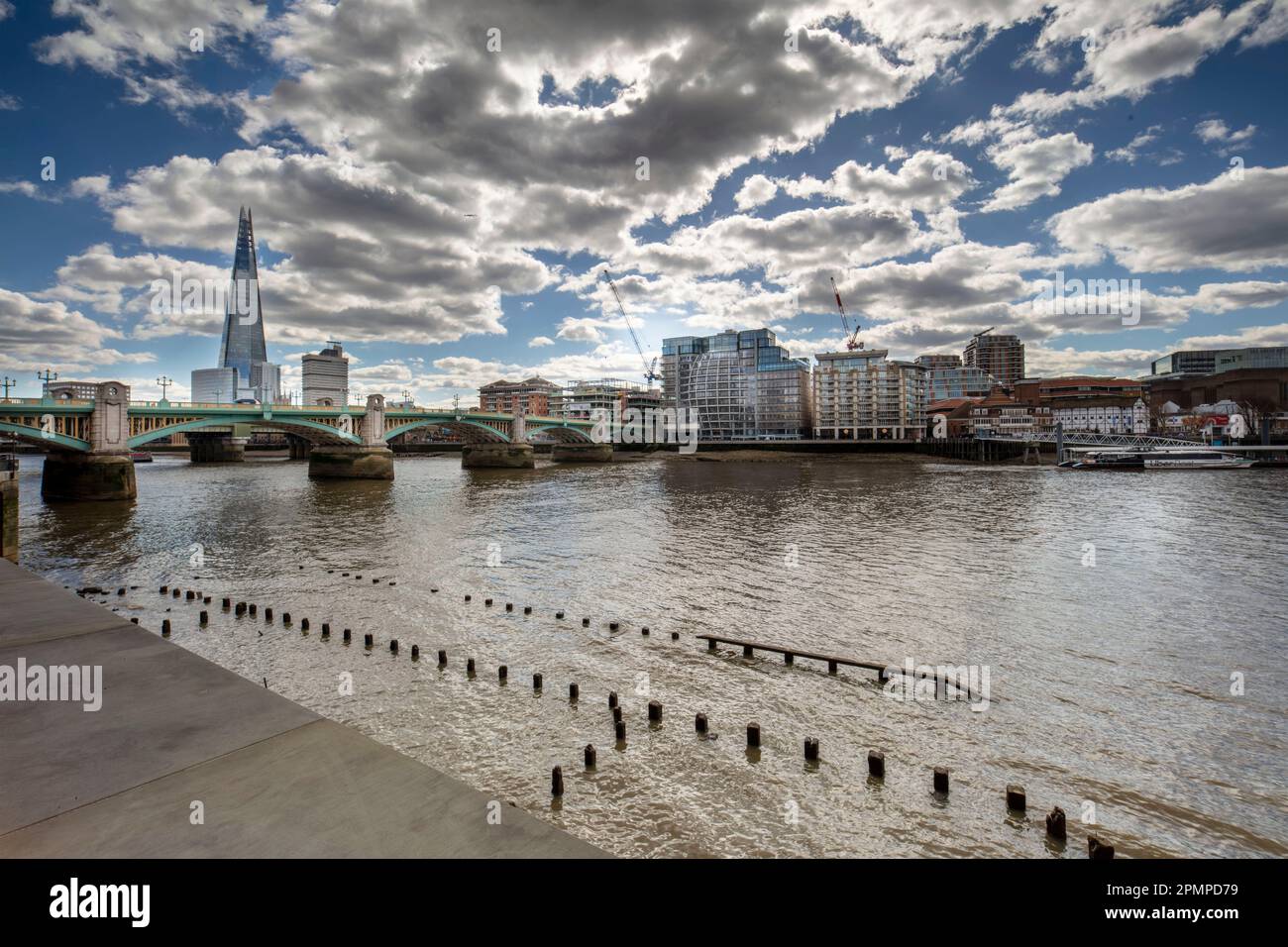 Architectural semi abstract view along the River Thames, London, with the Shard as a focal point. Good sky, high resolution with negative space Stock Photo