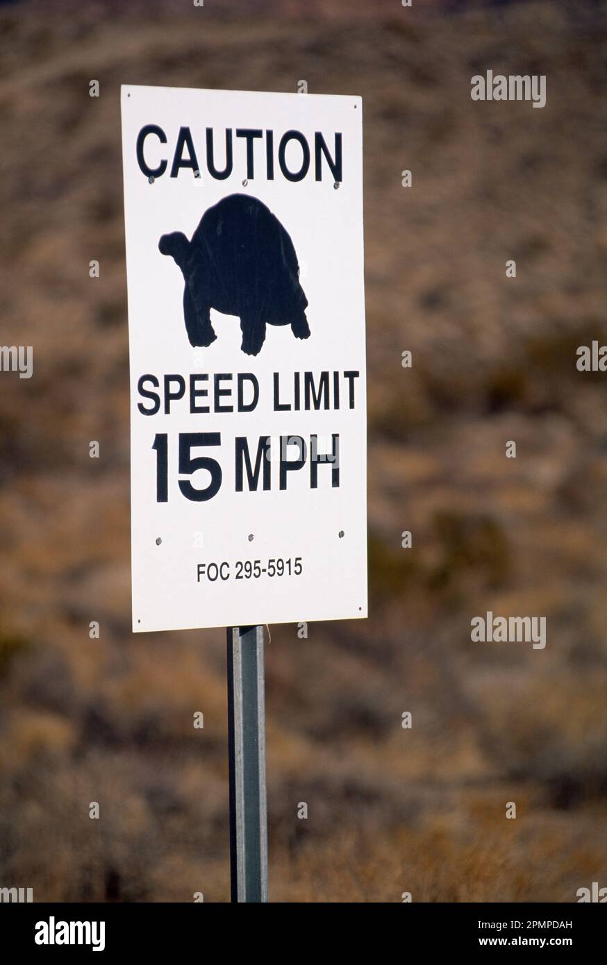 15 mph speed limit sign with a turtle silhouette in Snow Canyon State Park, Utah, USA; Utah, United States of America Stock Photo