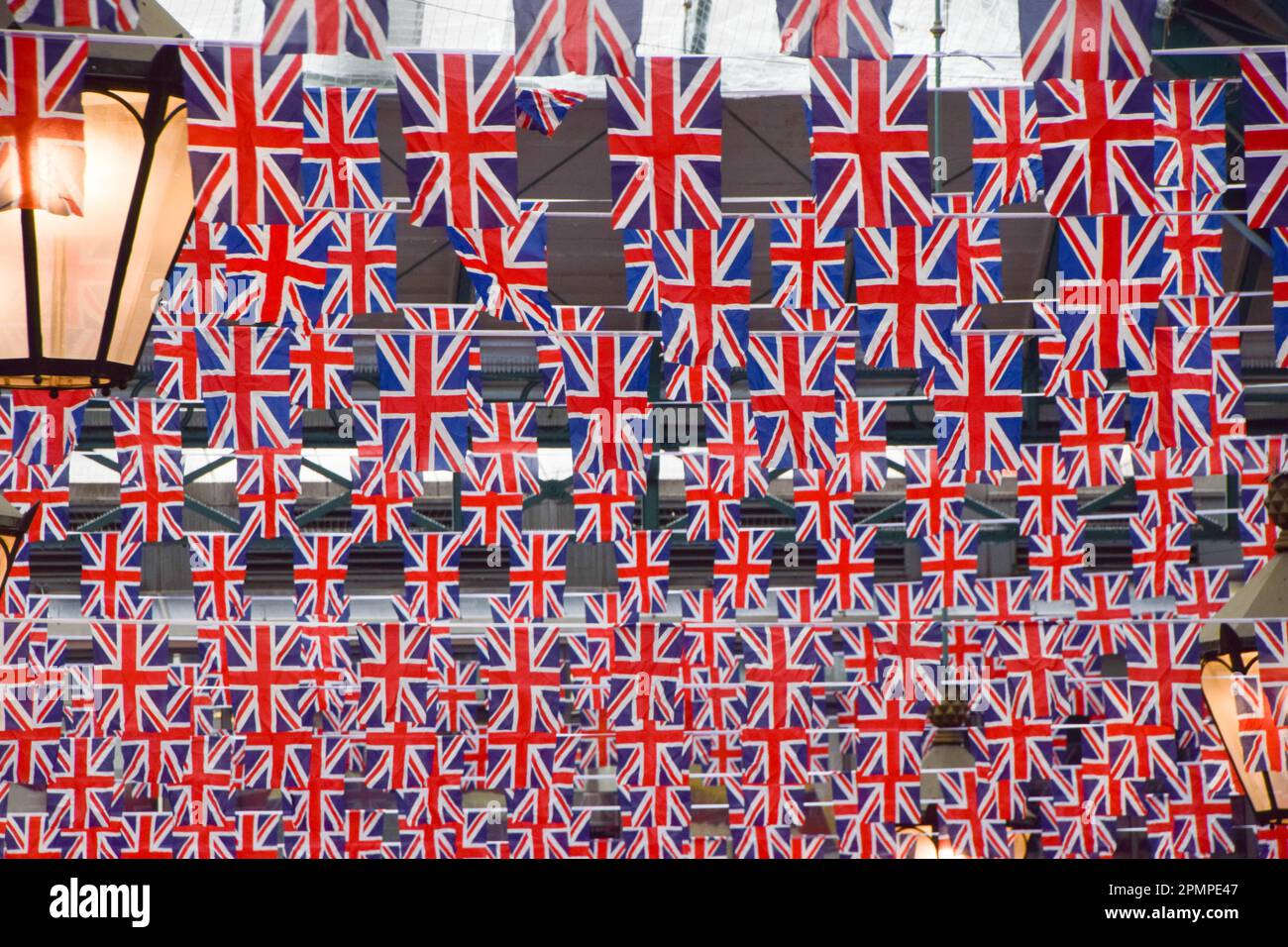 London, UK. 14th April 2023. Thousands of Union Jacks decorate Covent Garden Market as