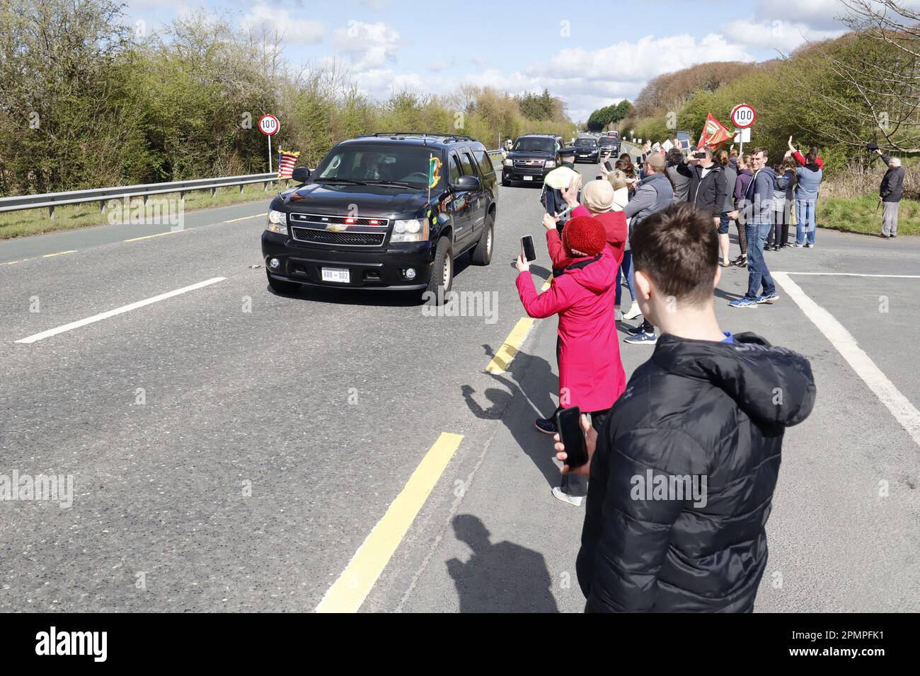 Crowds line the roadside on the N5 outside Castlebar County Mayo Republic of Ireland as President Joe Biden's motorcade passed by. Stock Photo