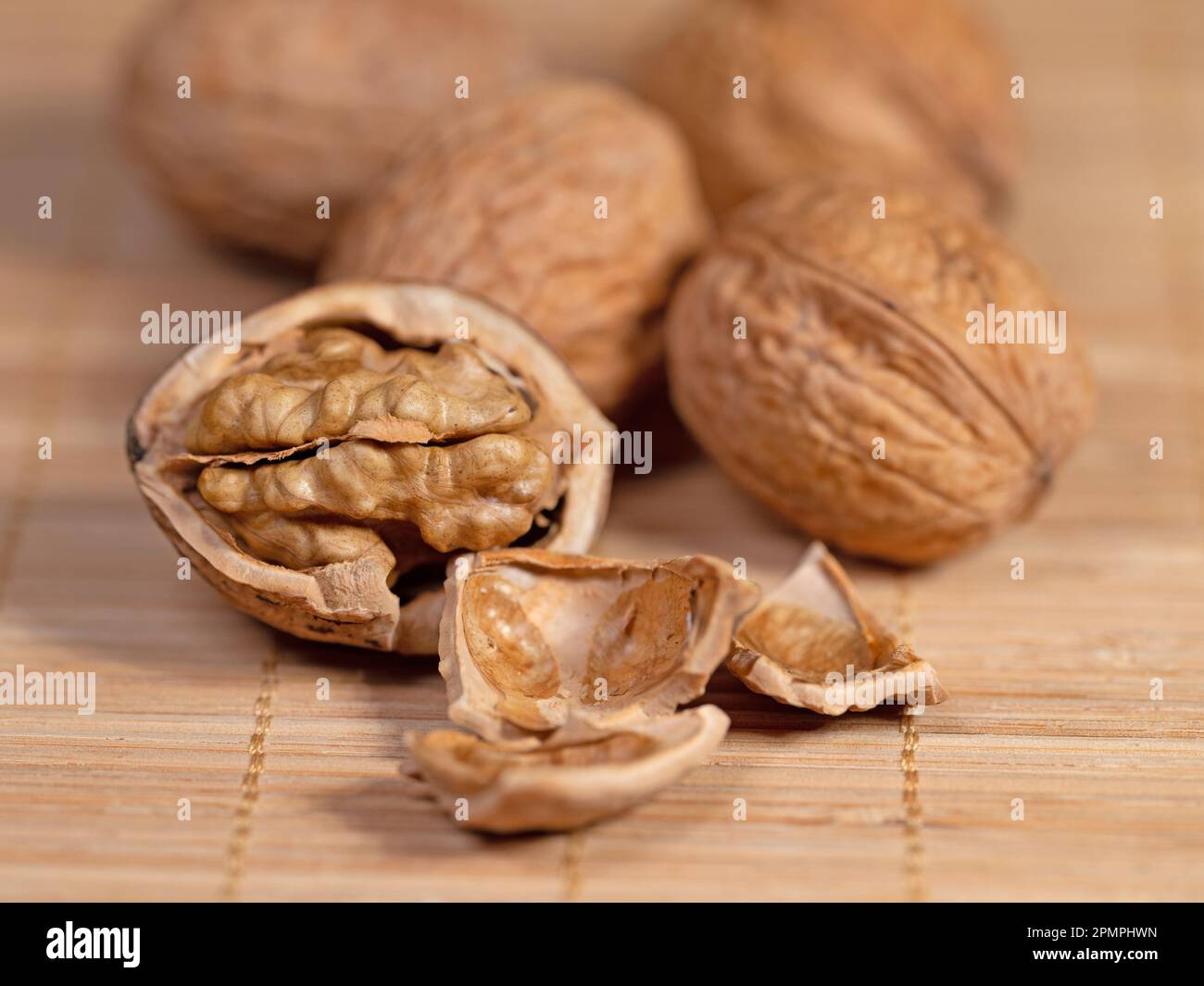 Walnut and nutshells in a close up Stock Photo - Alamy