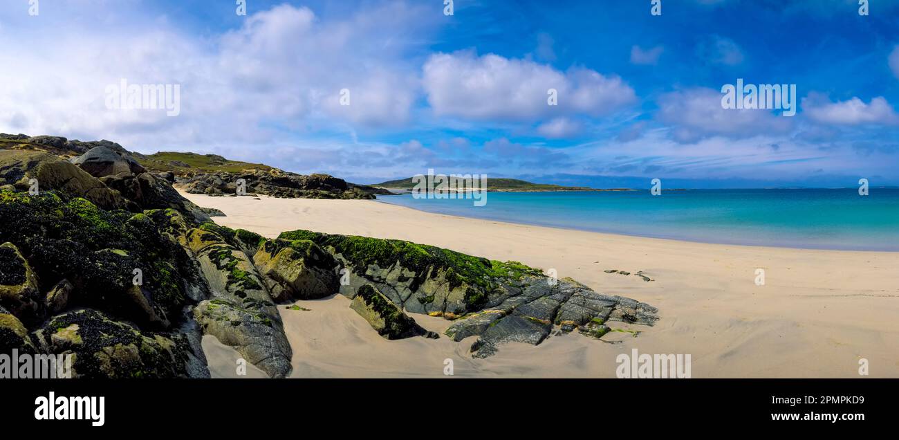 Beautiful sand beach and tranquil turquoise ocean water along the coast of Ireland; Ireland Stock Photo