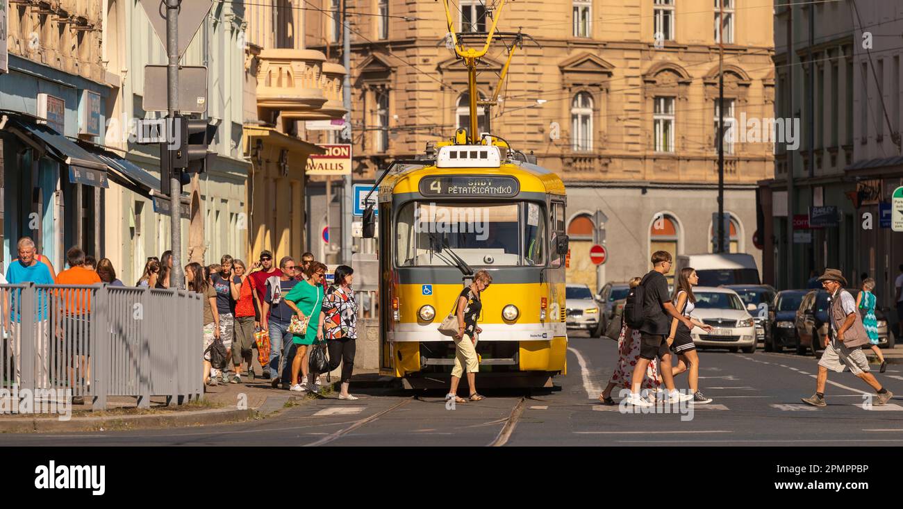 PILSEN, CZECH REPUBLIC, EUROPE - Tram streetcar and people crossing street, at Pilsen Main Square. Stock Photo