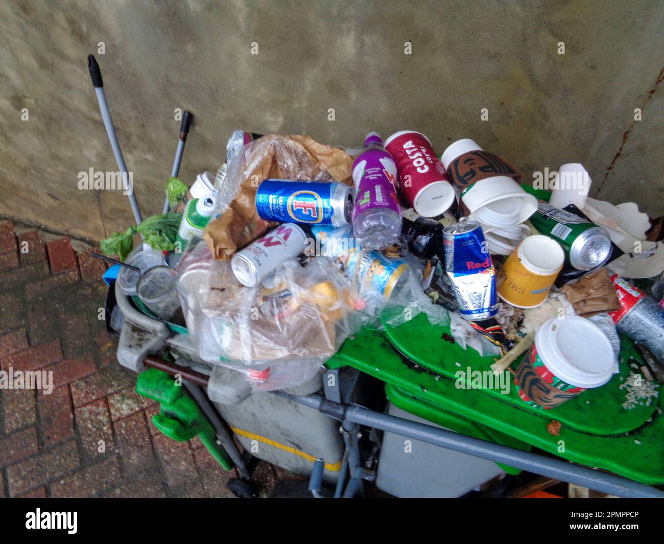 Clean up and waste found still life. Full mobile bins with collected