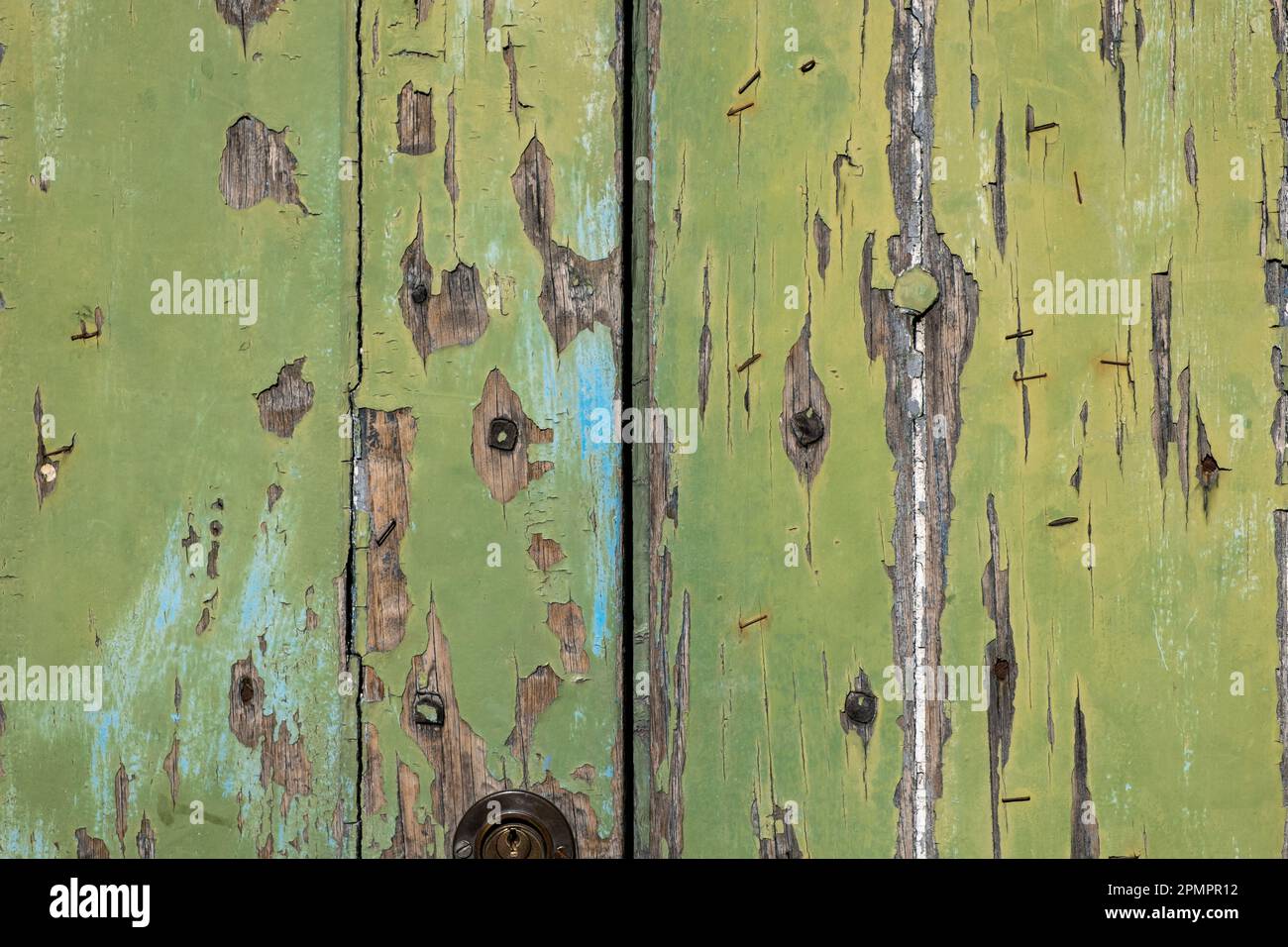 green painted and weathered wooden door Stock Photo - Alamy