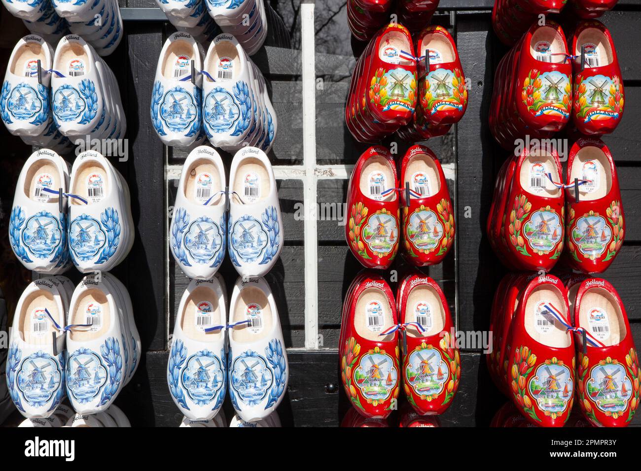 Amsterdam, The Netherlands, 23 March 2023: Souvenir Dutch clogs decorated with images of tulips and windmills, for sale at the Keukenhof gardens. Anna Stock Photo