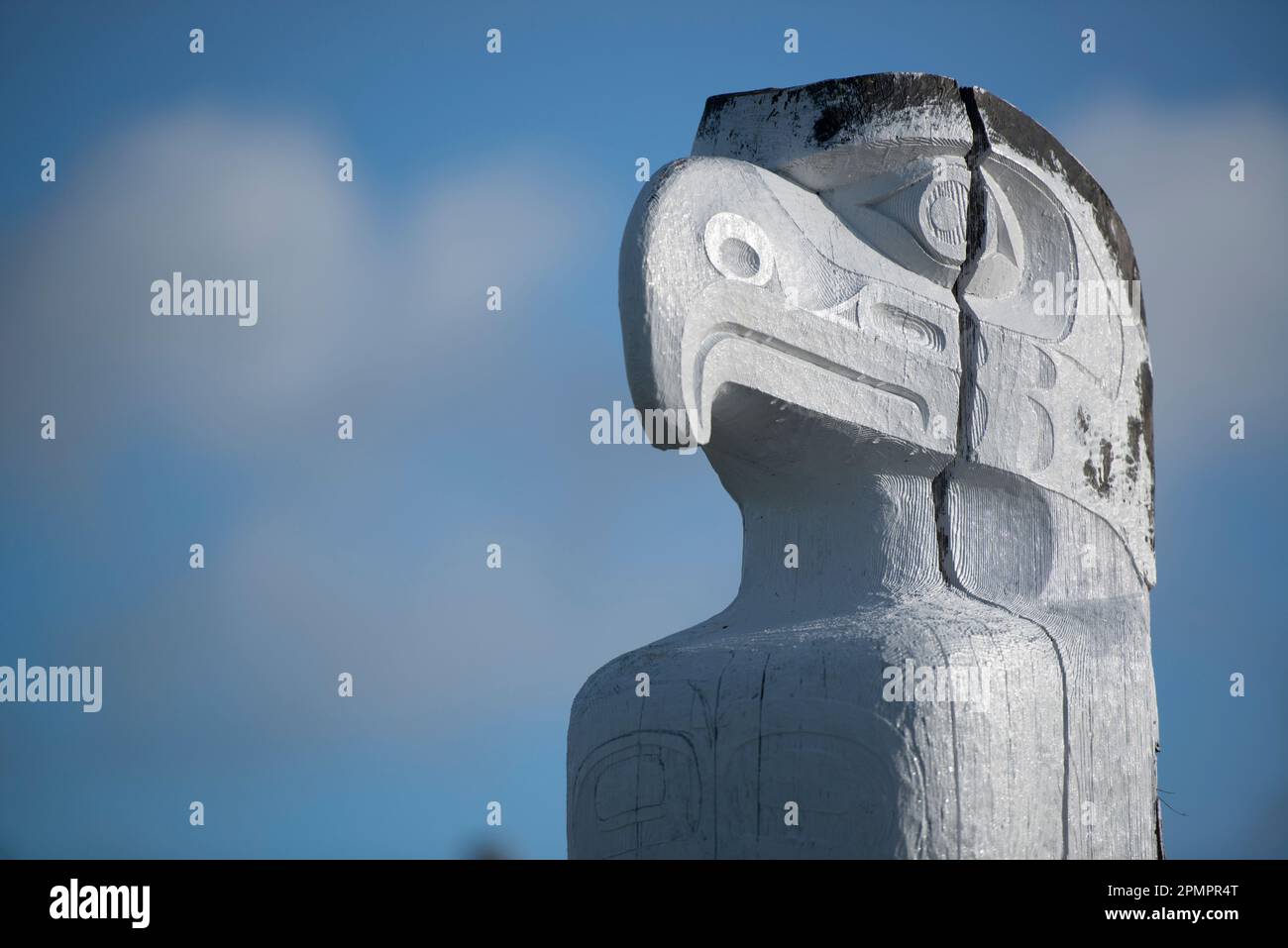 An eagle head on a totem pole Stock Photo - Alamy